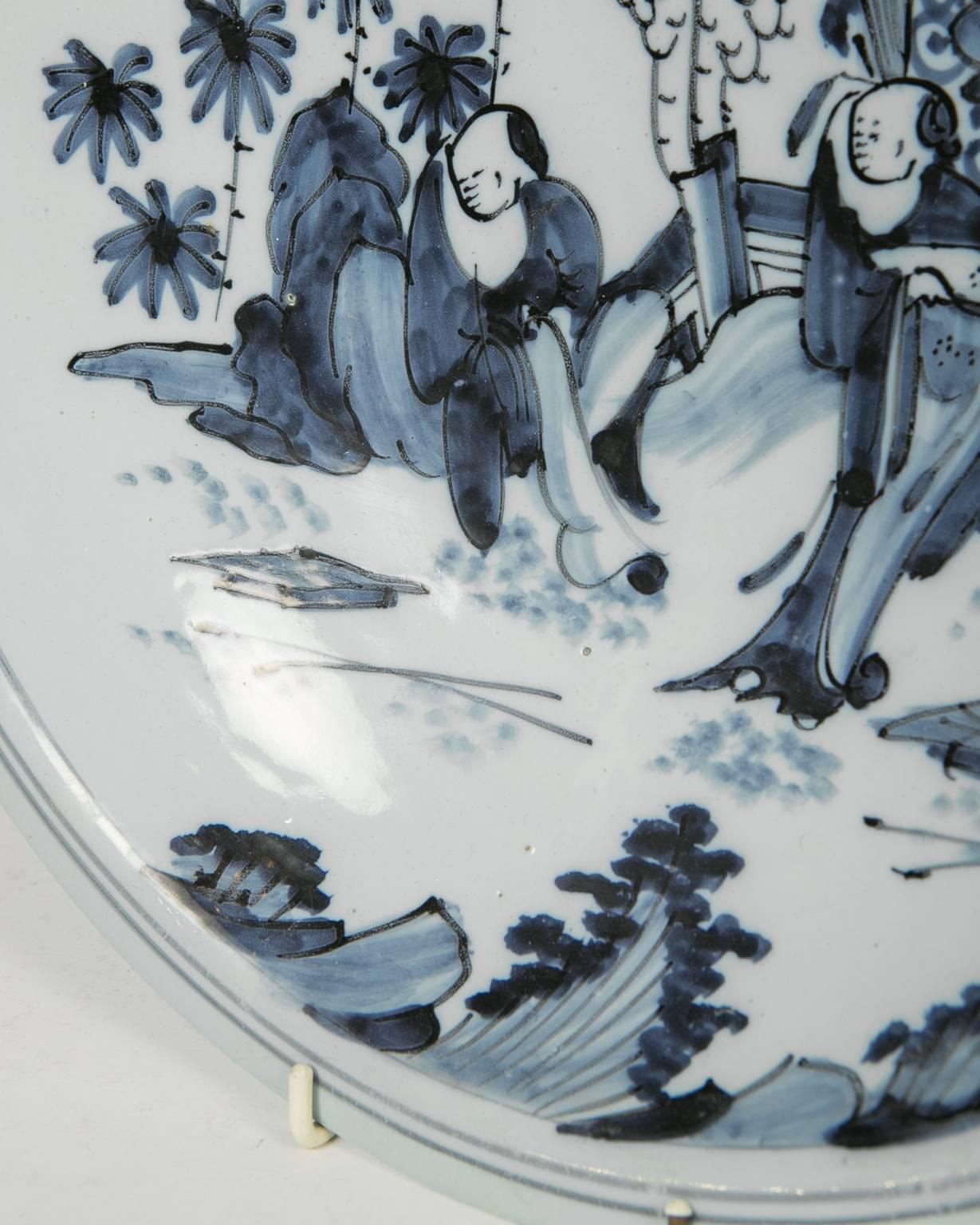 Hand-Painted Blue and White Delft Charger with Chinese Inspired Scene Made circa 1640-1650