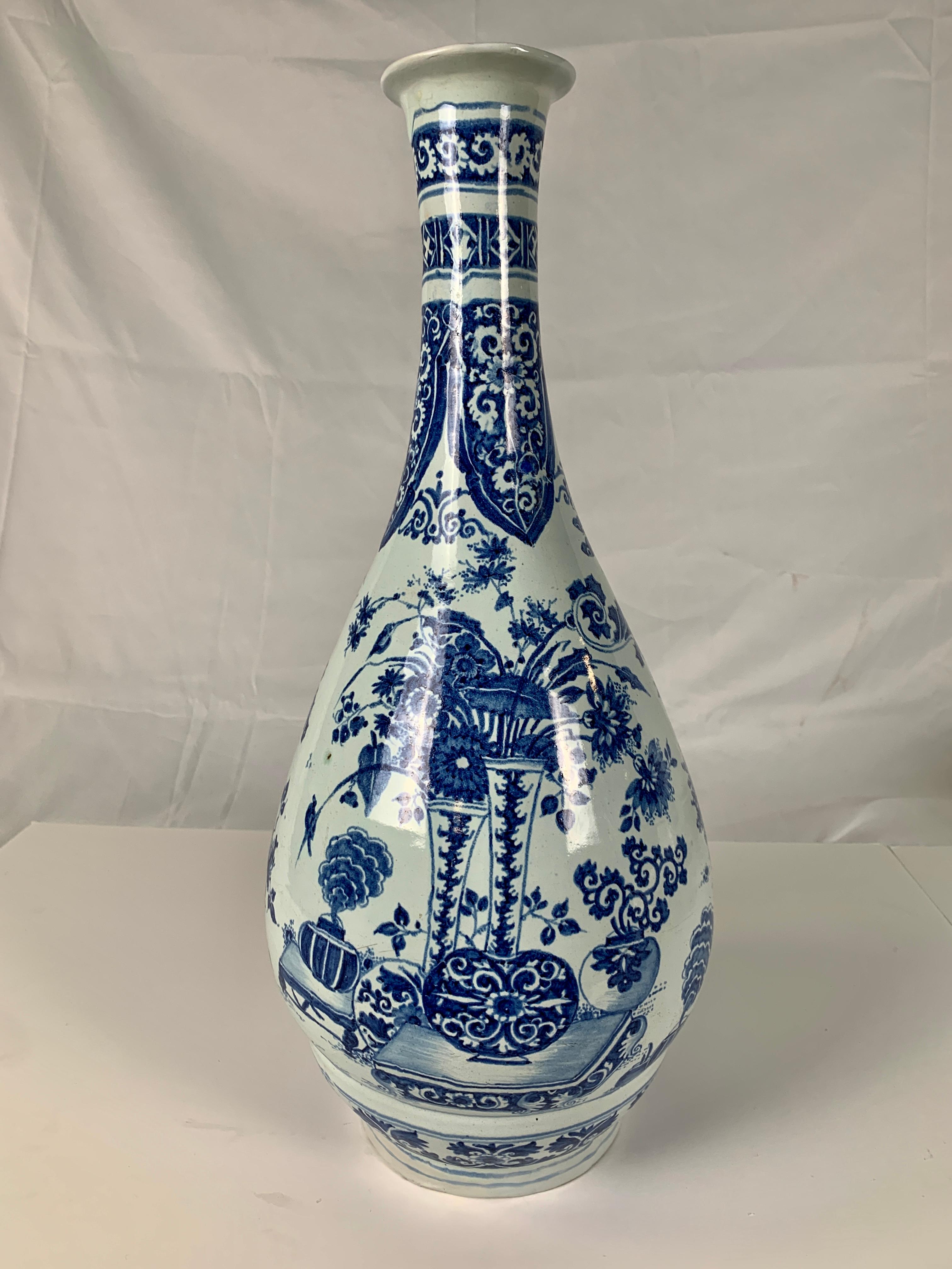 This extraordinary Delft vase dates to the late 17th century. It is modeled after Chinese pear-shaped bottles, conventionally known as “yuhuchun bottles,” made since the Ming dynasty (1368-1644). The vase's designs are partially inspired by