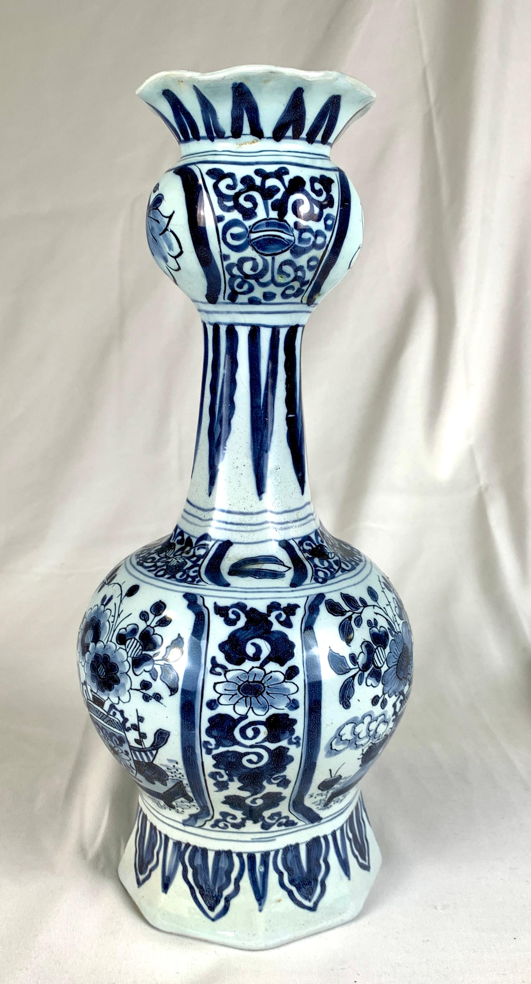 This blue and white Delft jar was made in the Netherlands in the early 18th century, circa 1730.
 The jar is covered in a gorgeous light blue glaze traditional to much early 18th century Dutch Delft.
 The style of painting is derived from