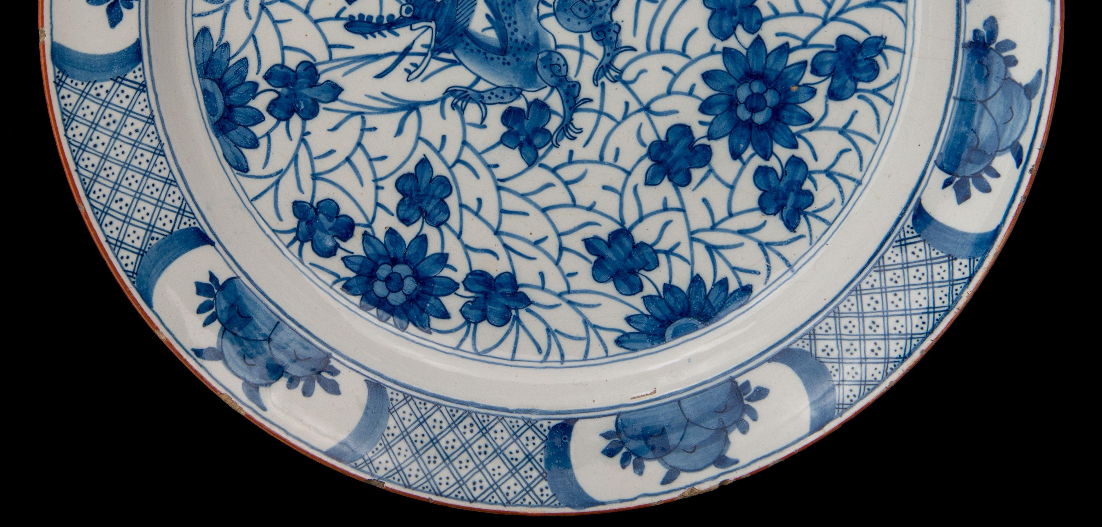 18th Century Blue and white dragon dish Delft, 1722-1757  The Greek A pottery For Sale