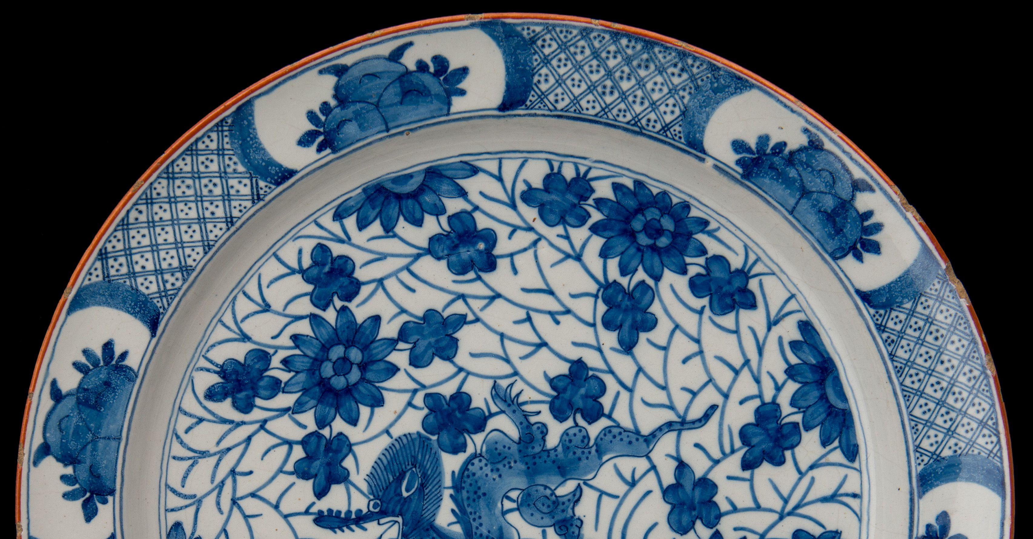 Ceramic Blue and white dragon dish Delft, 1722-1757  The Greek A pottery For Sale