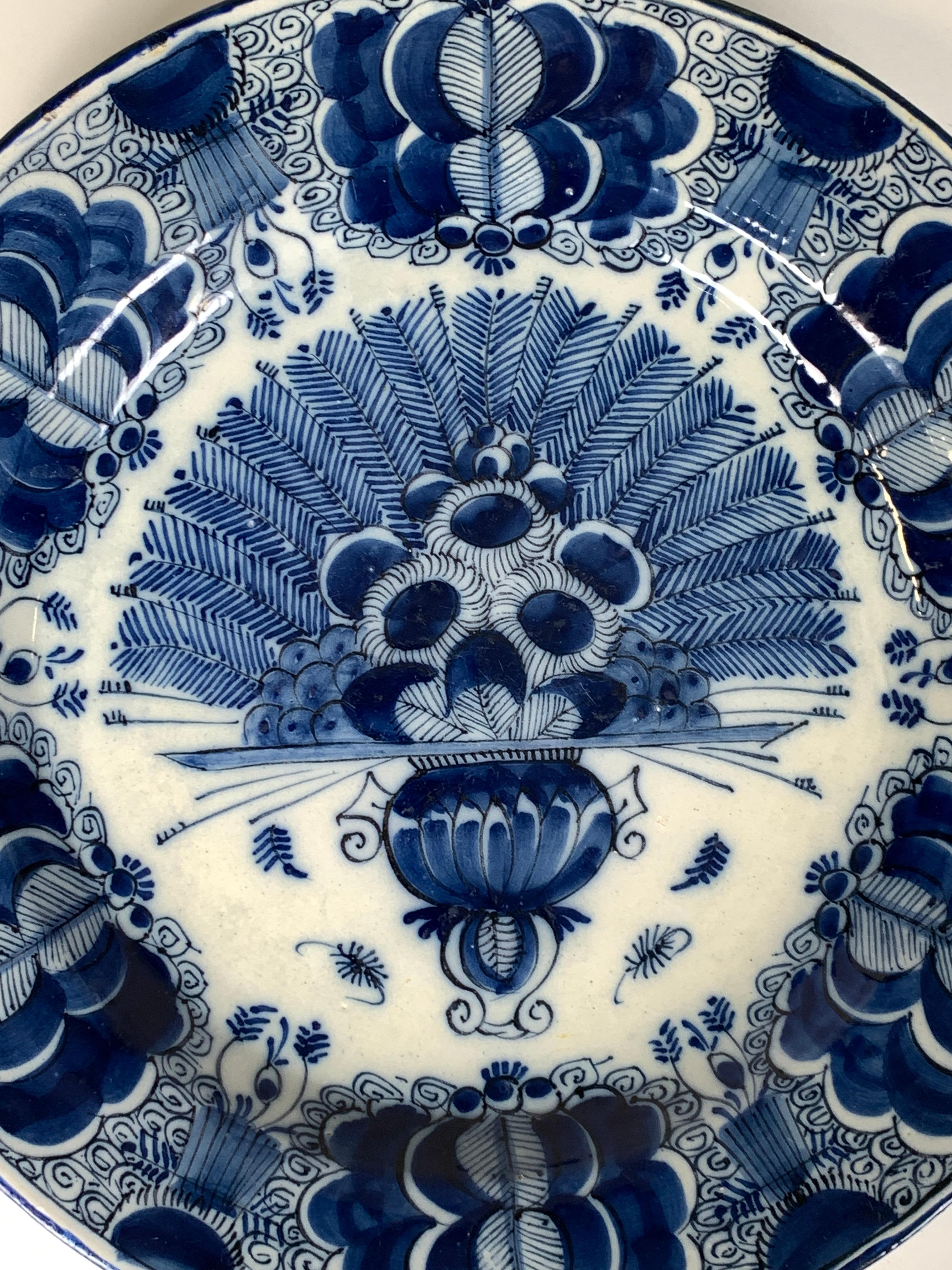 Why we love it: The intense cobalt blue
We are pleased to offer this sizeable Dutch Delft blue and white charger hand-painted in deep cobalt blue. This exquisite charger was made in the 18th century, circa 1780. It shows a vase filled with