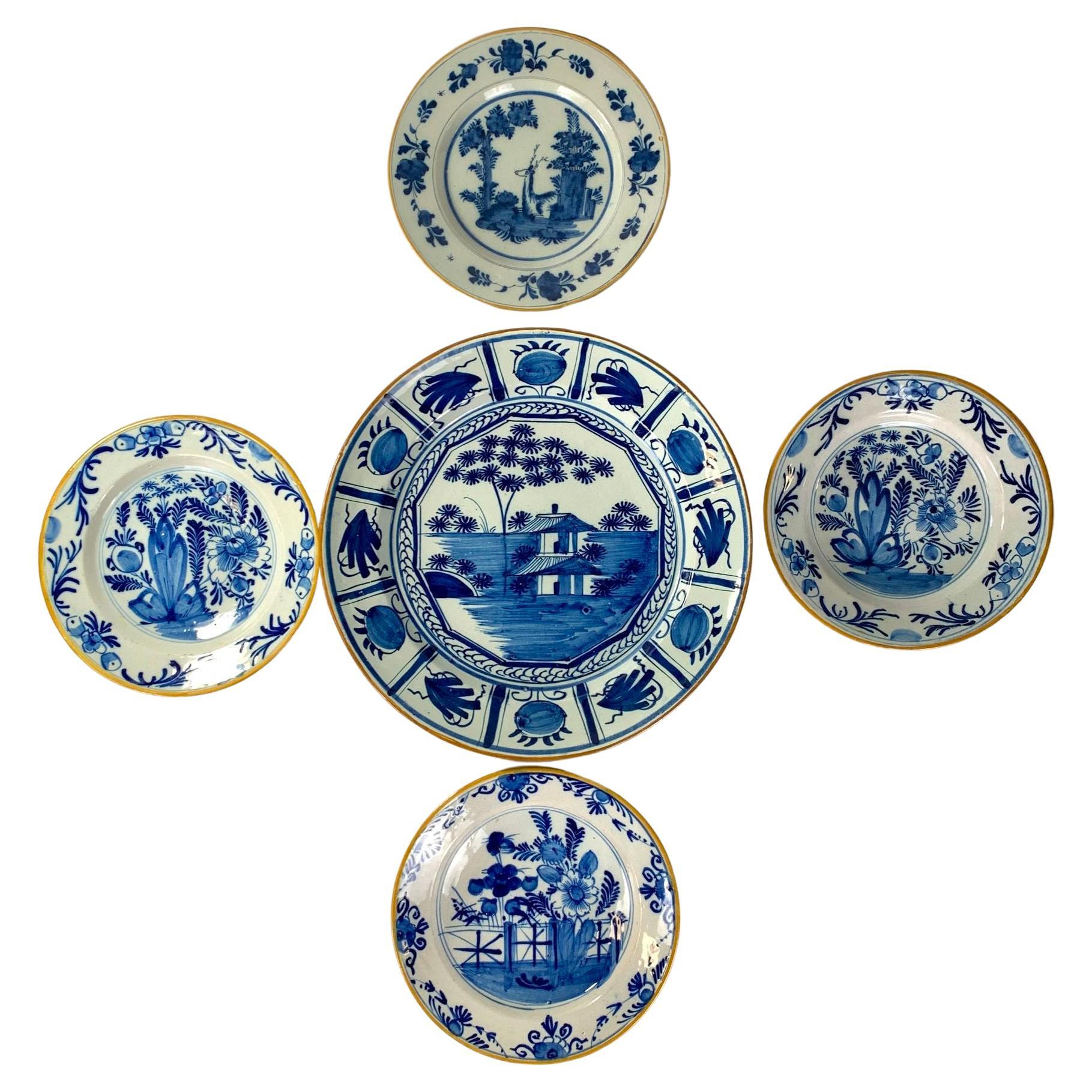 Blue and White Dutch Delft Hand Painted Charger and Four Plates Made 1780-1800 For Sale