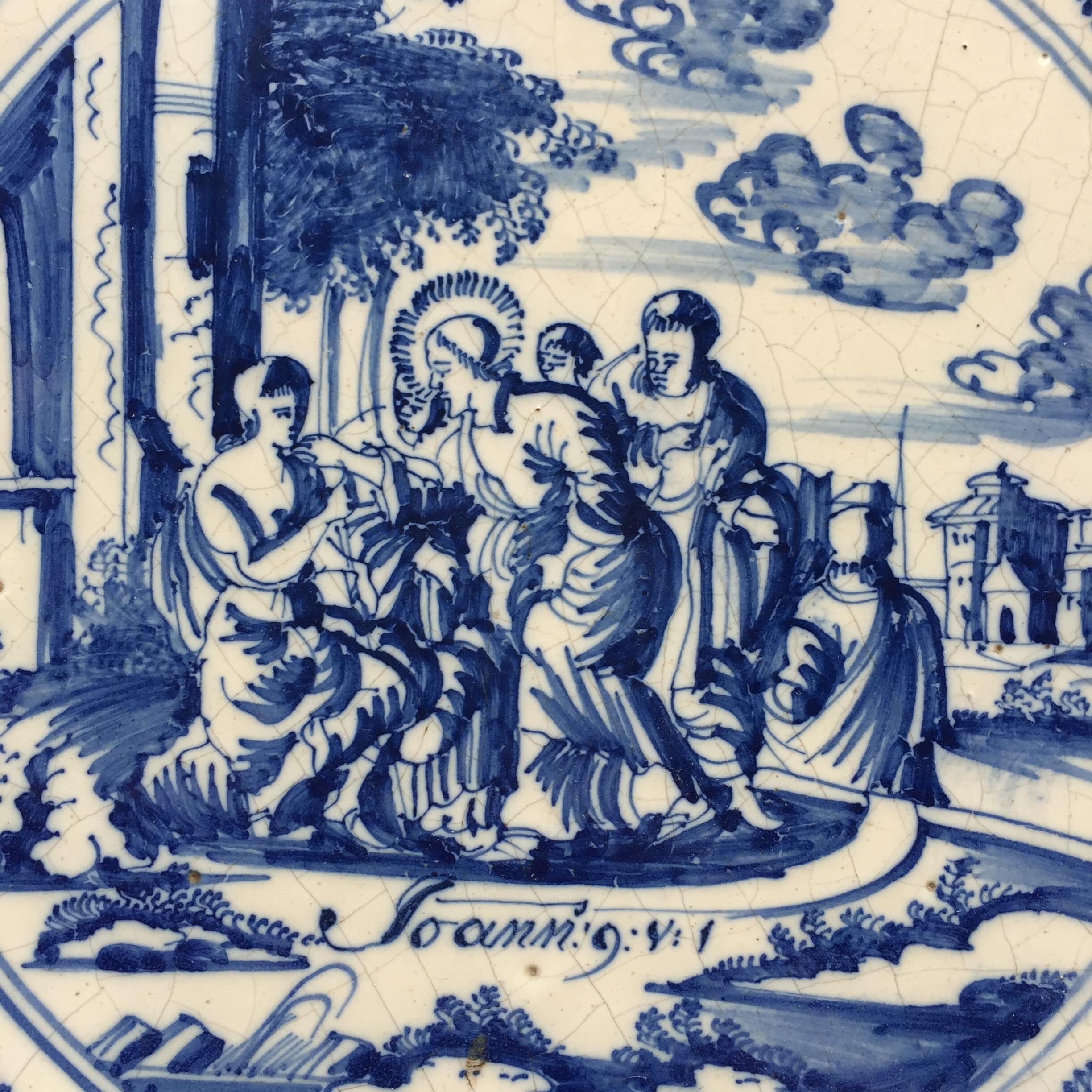 The Netherlands
Amsterdam
Circa 1725 – 1775

A fine blue and white Dutch tile with a New Testament biblical decoration of Jesus healing a blind born man, John 9 v 1.
These series of tiles with biblical stories from Amsterdam are well known for their