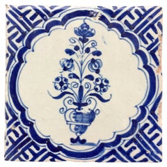 Antique Blue and White Dutch Delft Tile: Vase with flowers, 17th Century
