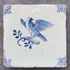 Blue and White Dutch Delft Tile with Bird, Mid 17th Century
