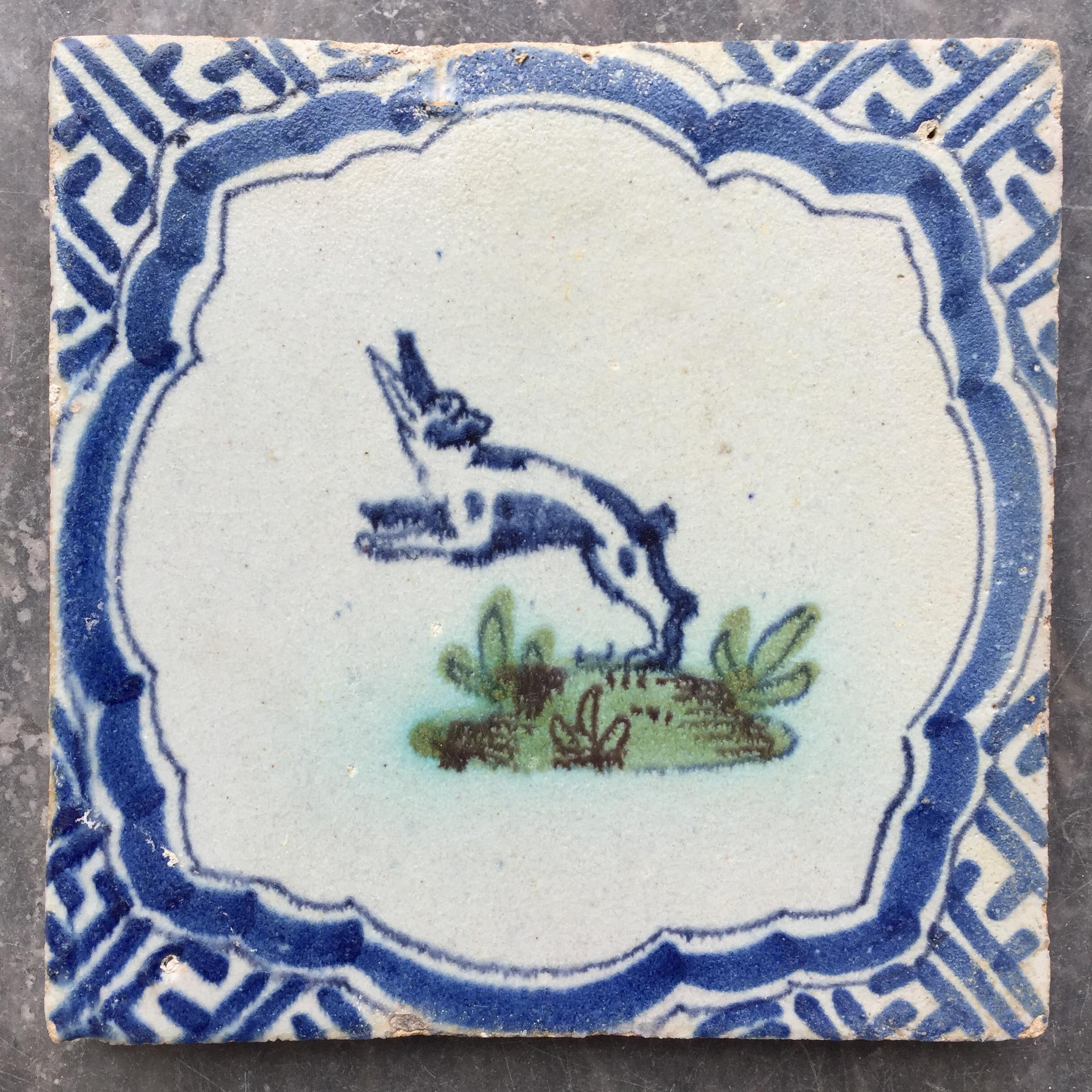 The Netherlands
Hoorn
Circa 1625 - 1650

A beautiful Wanli style tile with a painting of a blue hare on a green hill.

A genuine collectible of approximately 400 years old.