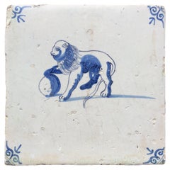 Antique Blue and White Dutch Delft Tile with Dutch Lion with Globe, Mid 17th Century