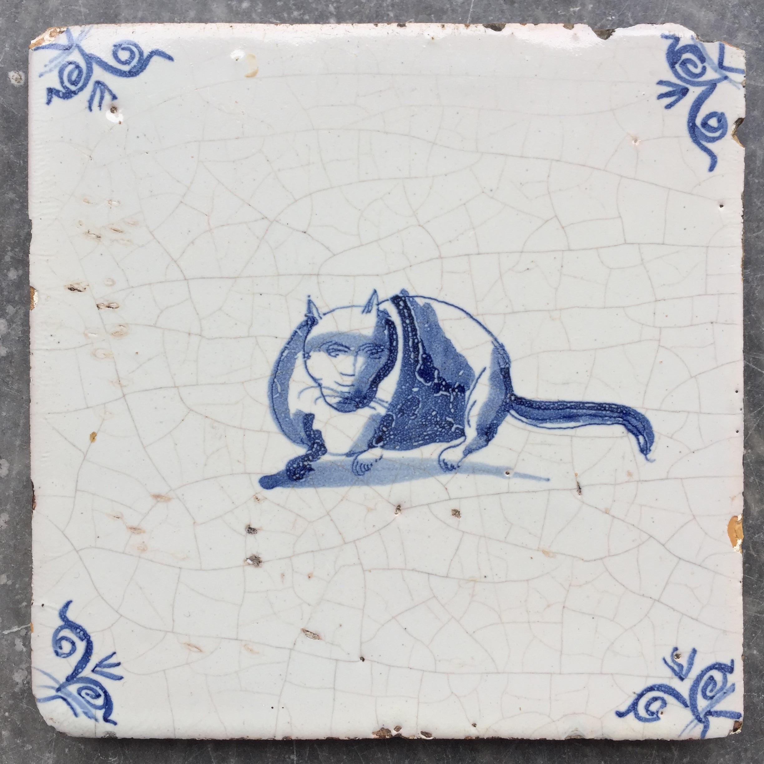 The Netherlands
Circa 1630 - 1660

A rare blue and white tile with the decoration of a nice fat cat!

Cats are quite rarely depicted on tiles, why is unknown.

With small oxheads as corner decoration.

A genuine collectible of approximately 400