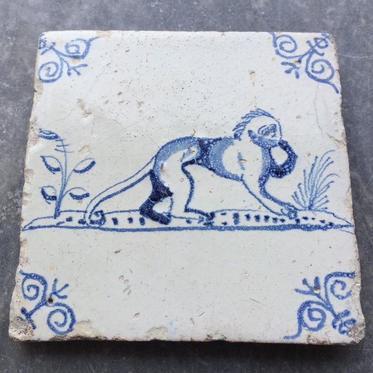 Fired Blue and White Dutch Delft Tile with Monkey, Mid 17th Century For Sale