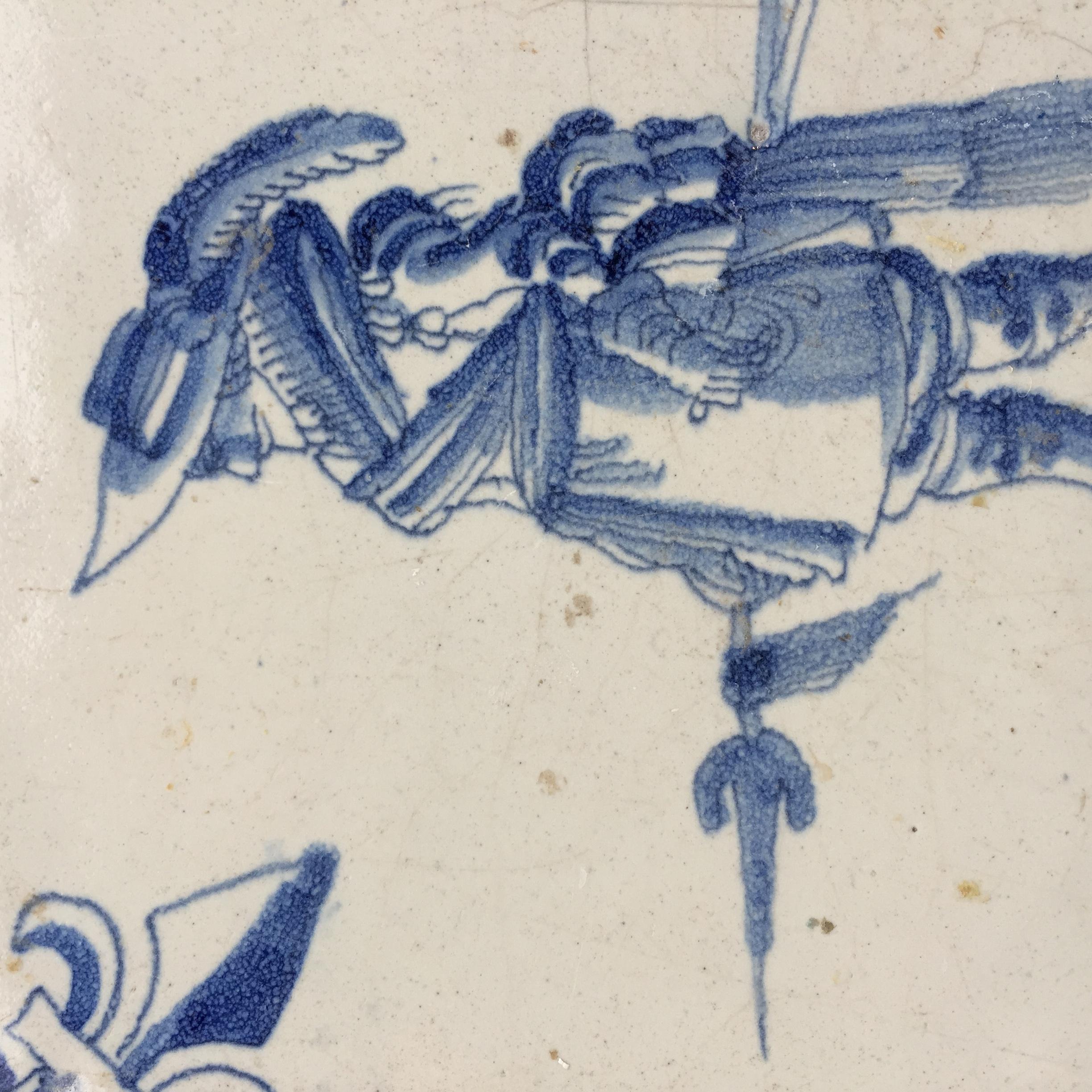 Baroque Blue and White Dutch Delft Tile with Pikier, Mid 17th Century For Sale