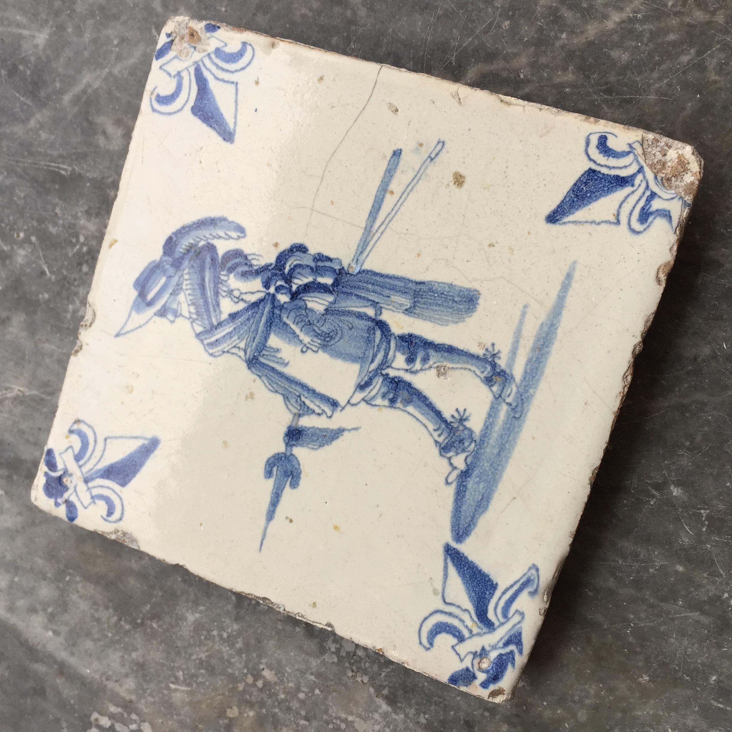 Fired Blue and White Dutch Delft Tile with Pikier, Mid 17th Century For Sale