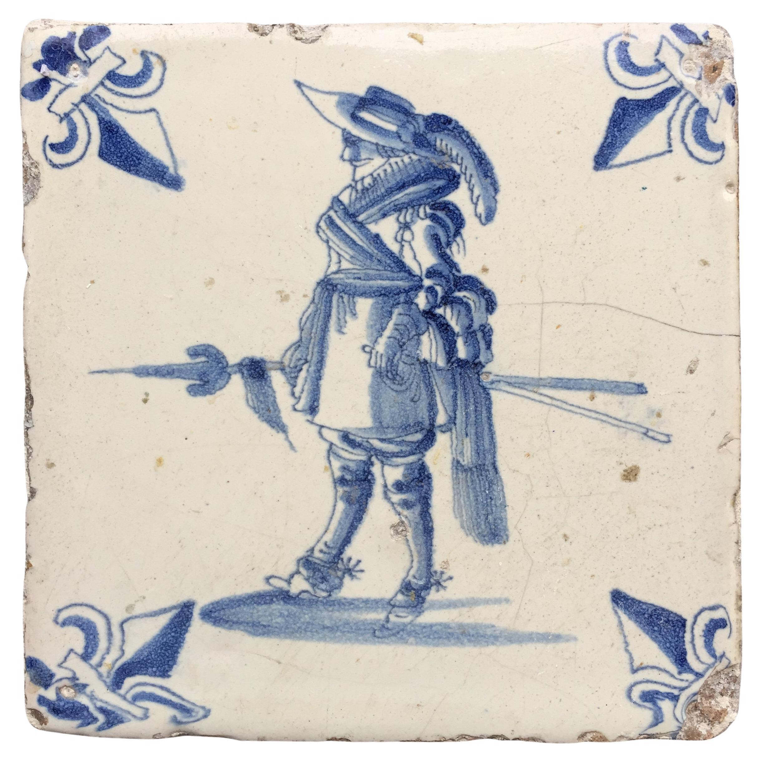 Blue and White Dutch Delft Tile with Pikier, Mid 17th Century For Sale