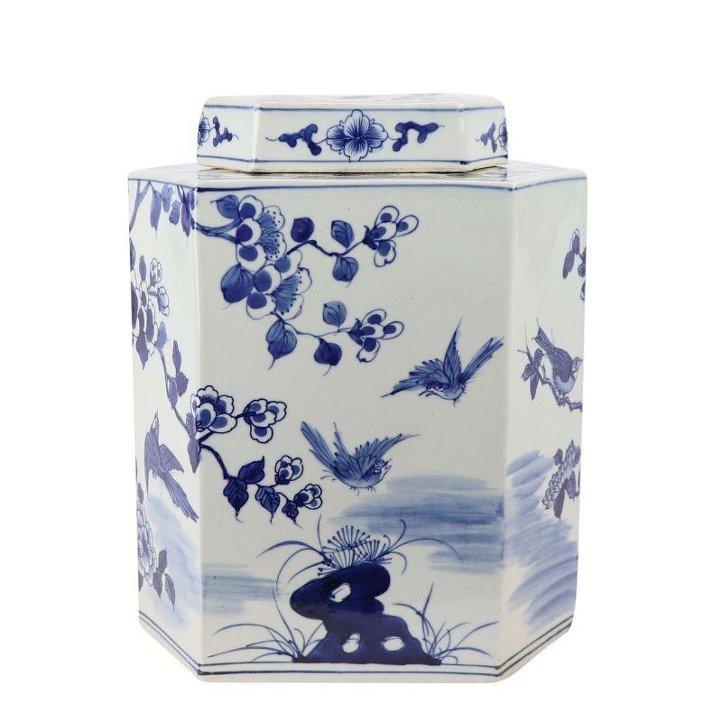 Blue And White Flat Hex Bird Floral Jar

Size (inches) : 10W x 6.5D x 12.5H

High fire porcelain, 100% hand shaped, hand painted. Square shape is never perfect. Distress, chips and other imperfections create great characters of this special