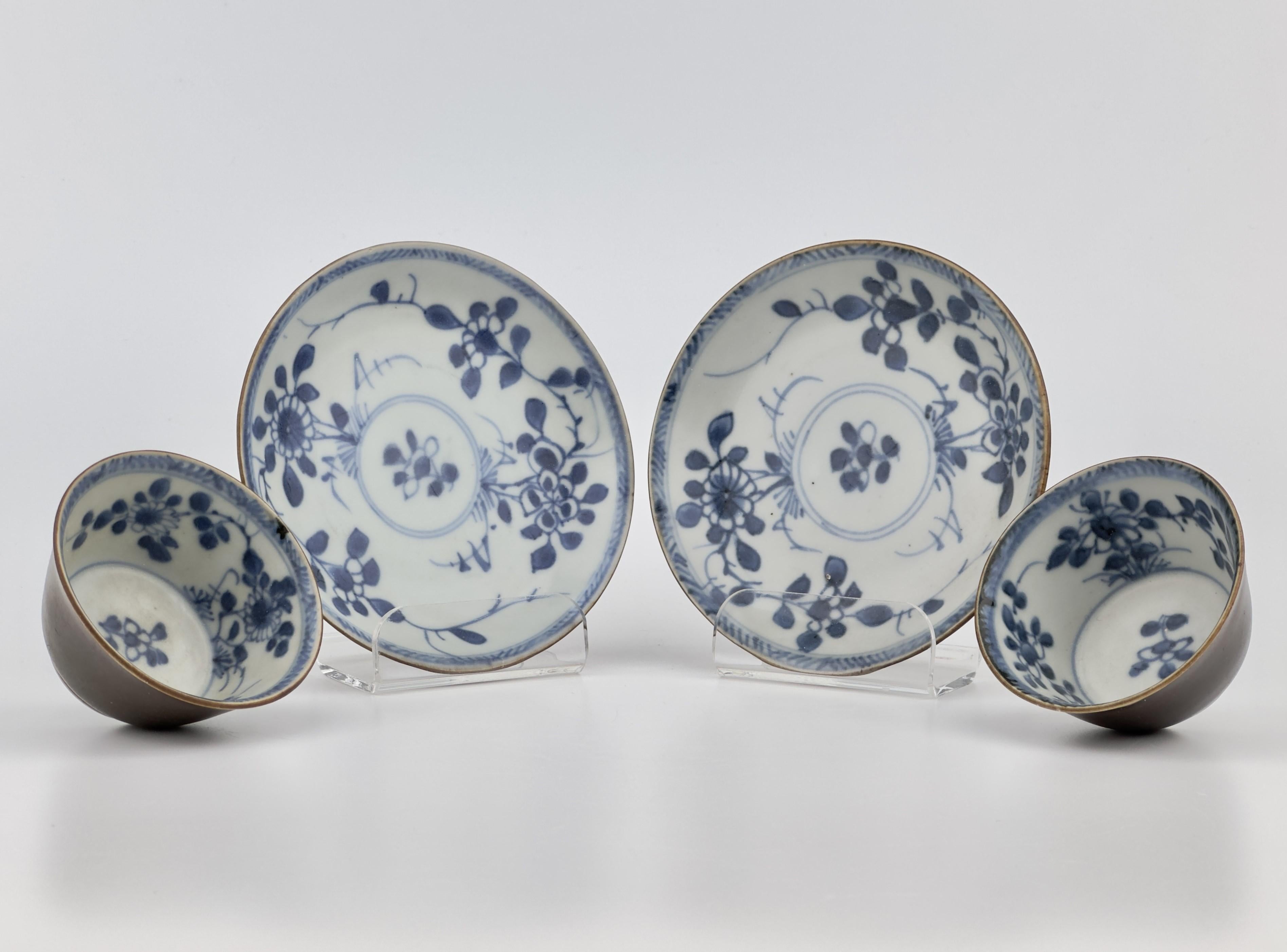 They display central floral motifs surrounded by a variety of botanical patterns including branches and blooms, indicative of classic East Asian ceramic artistry.

Period : Qing Dynasty, Yongzheng Period
Production Date : C 1725
Made in :