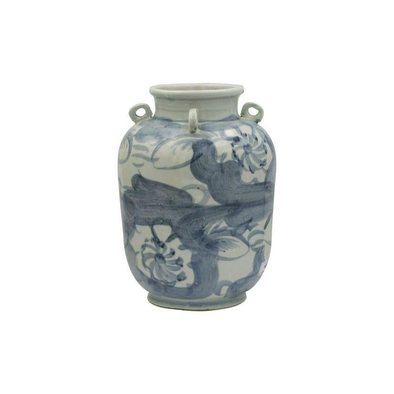 Blue and white four loop handle jar twisted flower motif

The special antique process makes it looks like a piece of art from a museum. 
High fire porcelain, 100% hand shaped, hand painted. Distress, chips and other imperfections create great