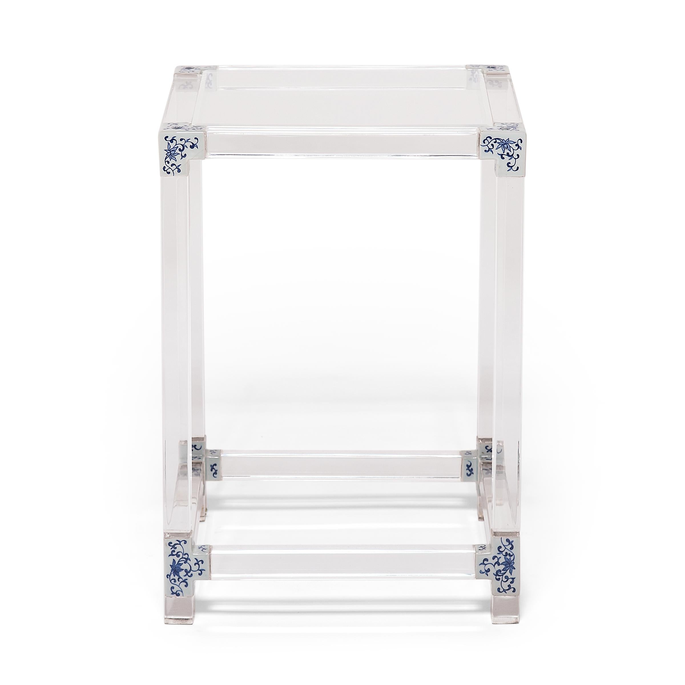 Each limited-edition blue and white invisible side table by artist July Zhou is fashioned after a traditional Ming dynasty example. Unlike other Lucite furniture that is injection molded, July's work is created by skilled artisans who heat, join,