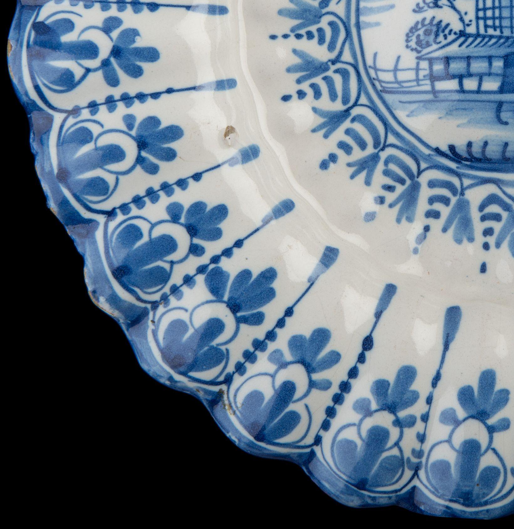 Blue and White Lobed Dish with Landscape, Northern Netherlands, 1640-1660 In Good Condition For Sale In ROSSUM, GE