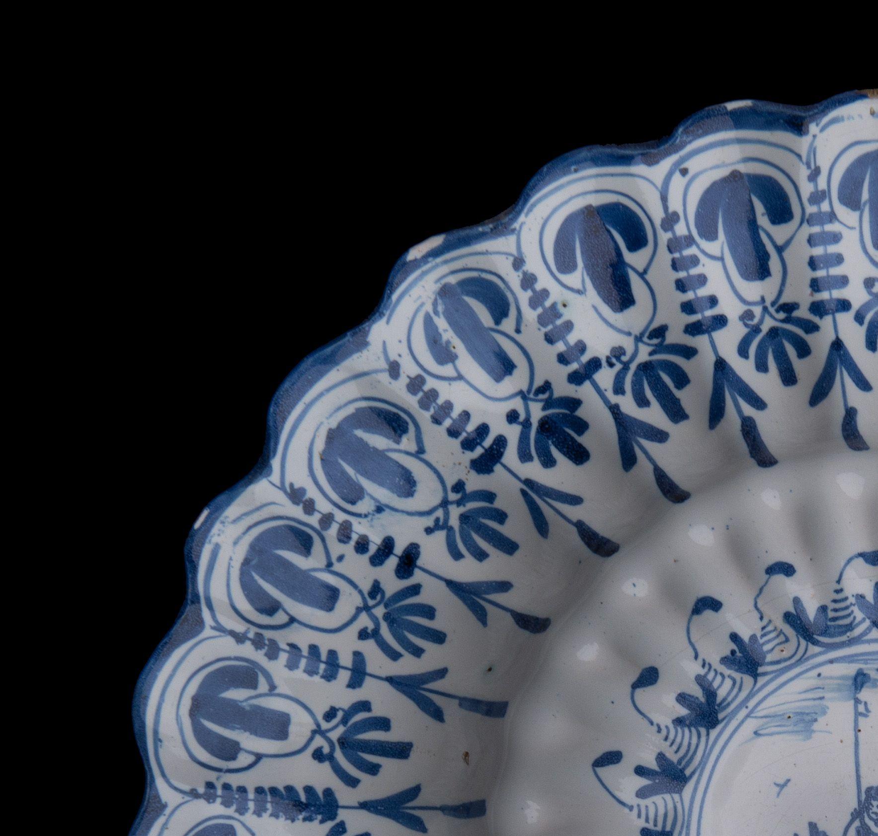 Dutch Blue and White Lobed Dish with Shepherd, Northern Netherlands, 1650-1680 For Sale