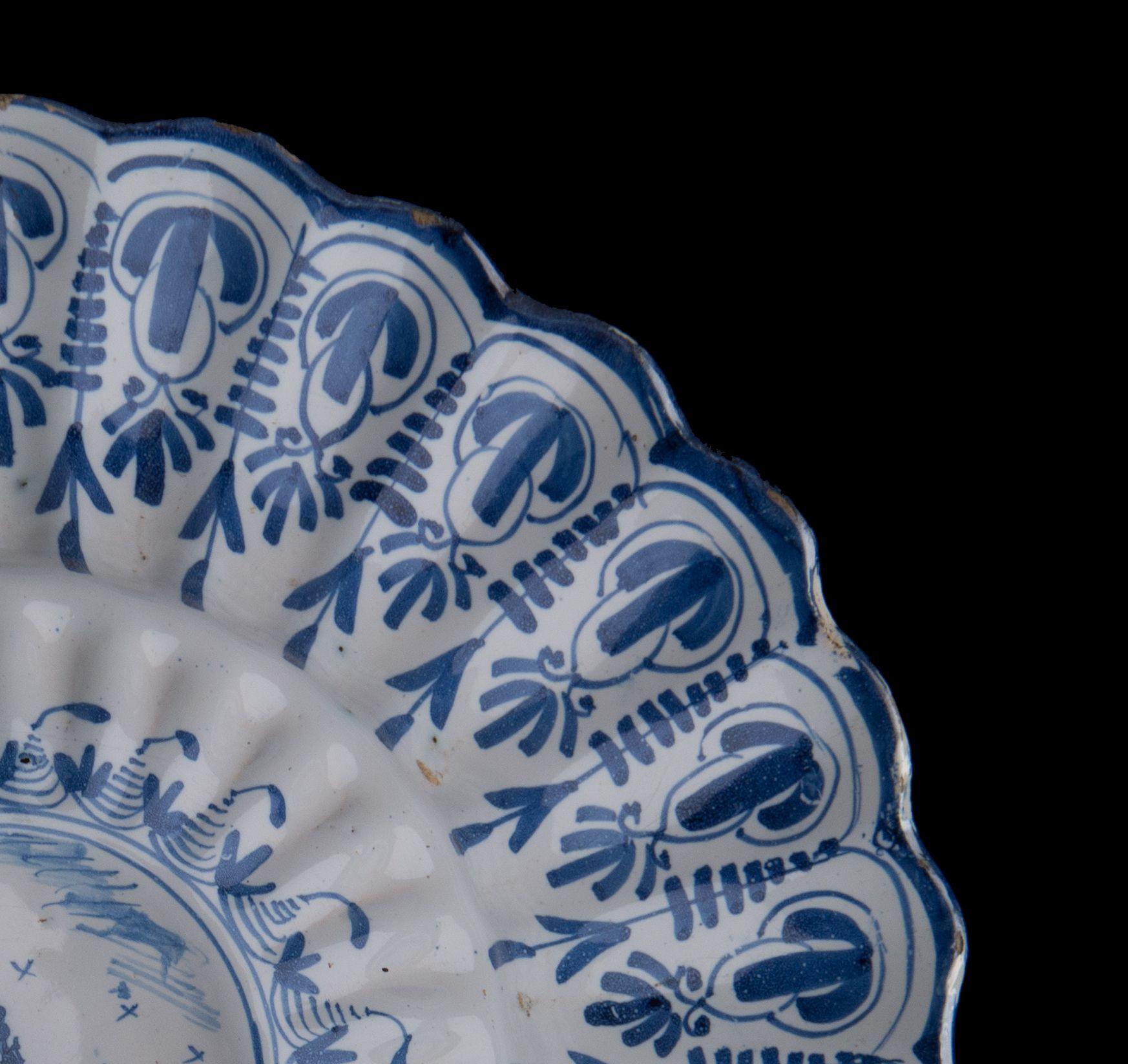 Glazed Blue and White Lobed Dish with Shepherd, Northern Netherlands, 1650-1680 For Sale