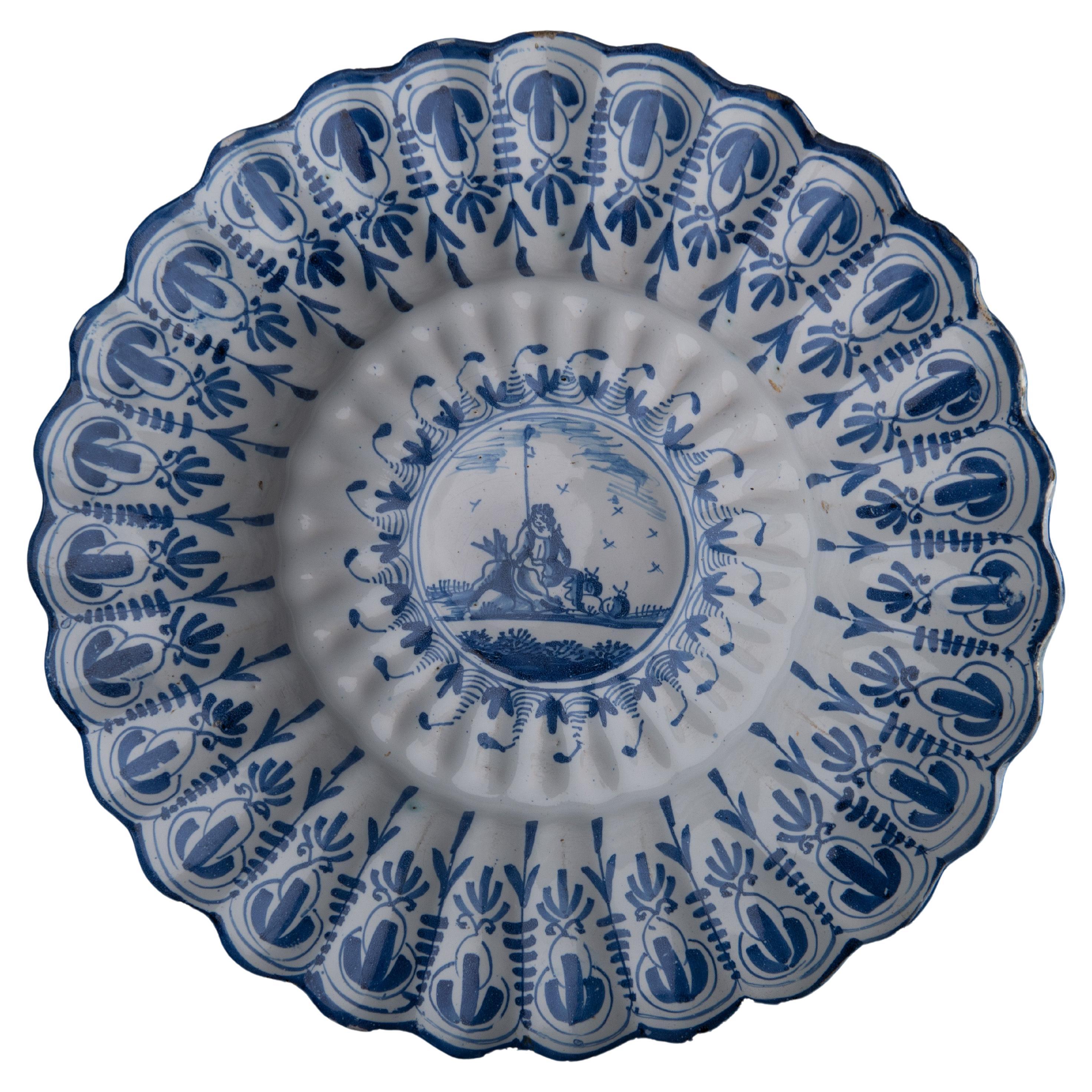 Blue and White Lobed Dish with Shepherd, Northern Netherlands, 1650-1680 For Sale