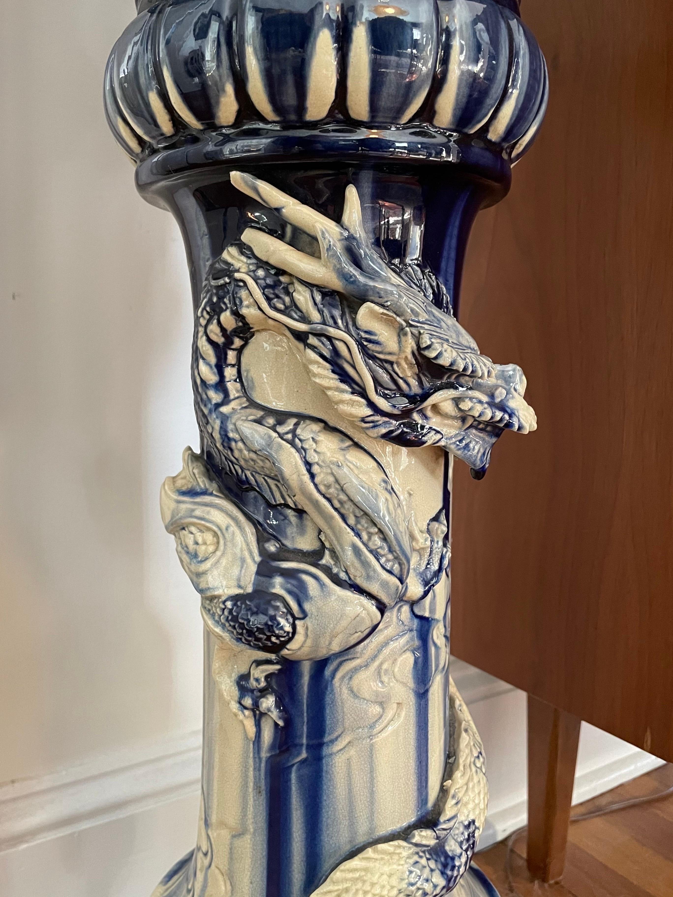 Chinoiserie Blue and White Majolica Urn on Dragon Stand For Sale