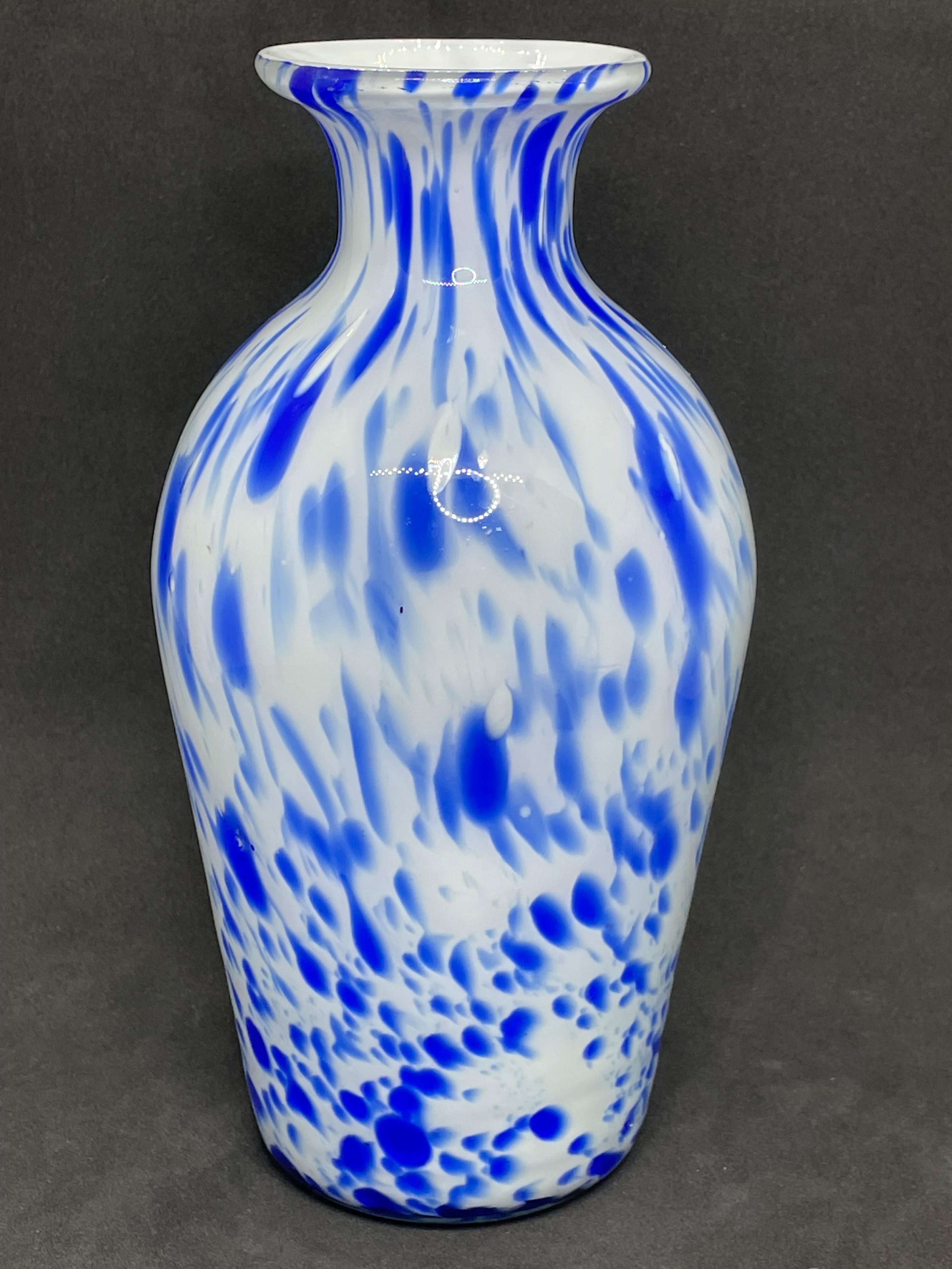 Beautiful Murano hand blown Italian art glass vase. Blue and white and light blue colors. A beautiful piece of art for any room. Diameter on top is approx. 2.25