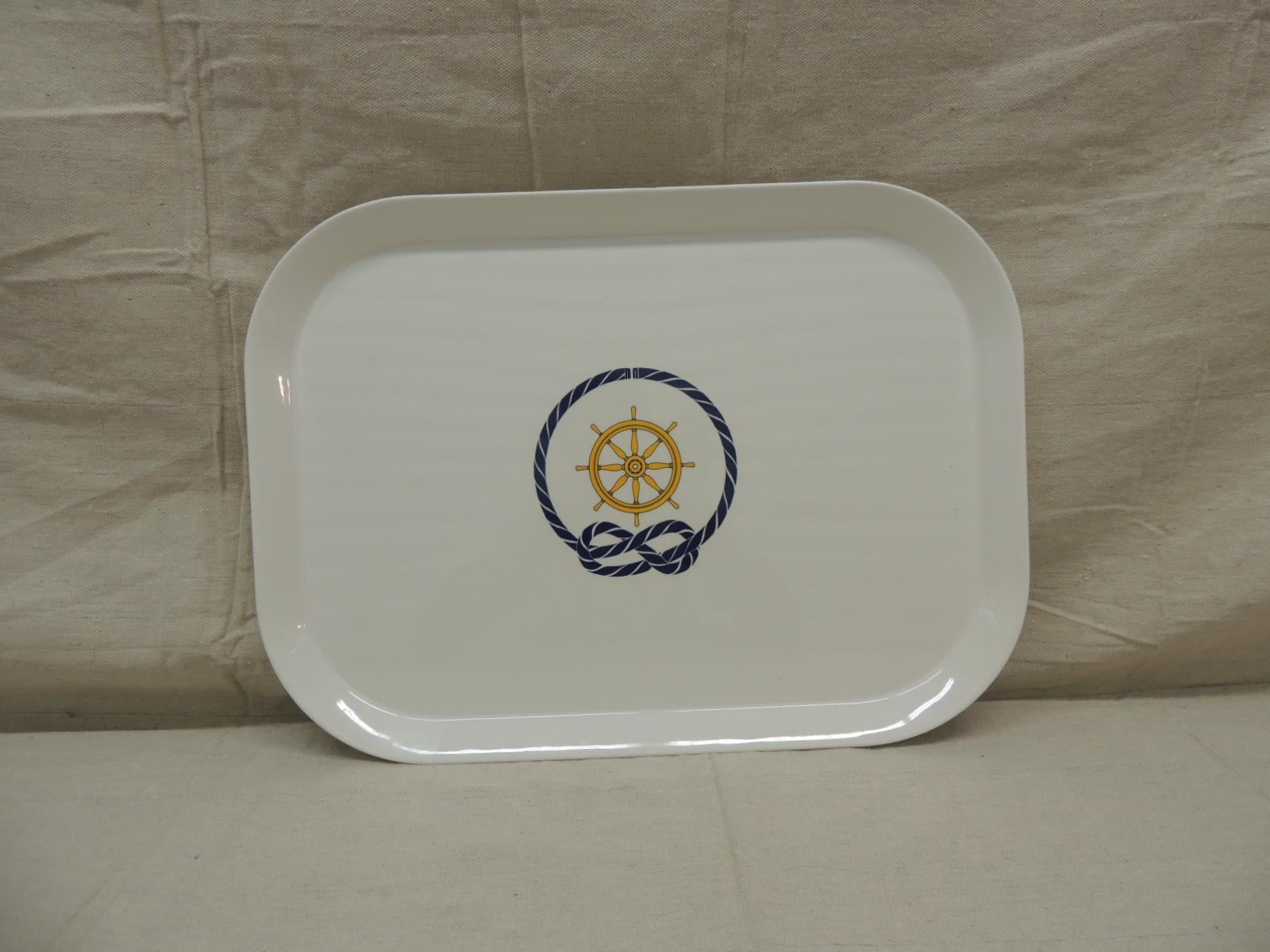 Blue, yellow and white nautical theme oval tray.
Rope and anchor design.
Carta fina, Verona, Italy
Size: 17.5 x 13 D x 0.75 H.
 