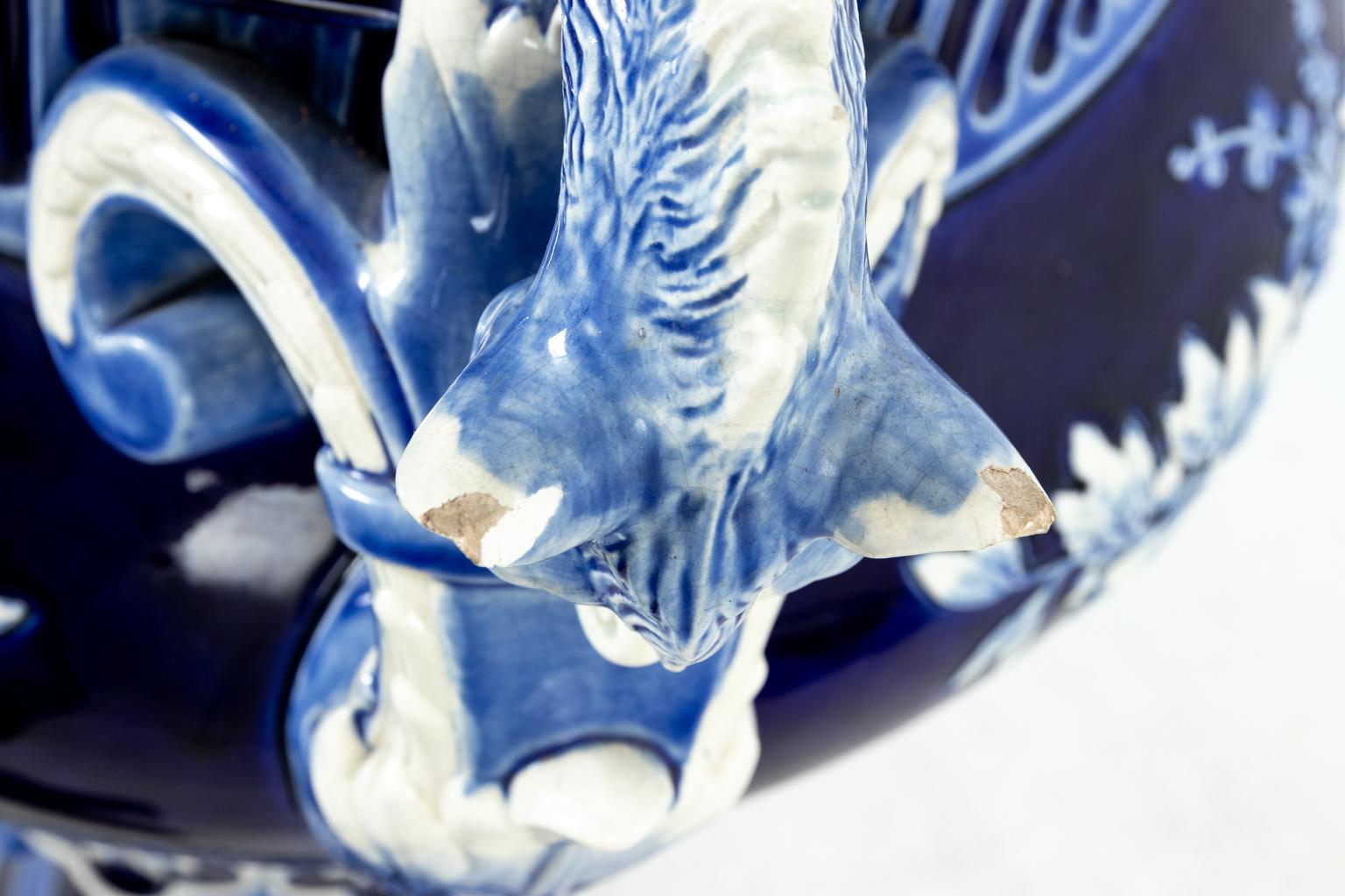 Neoclassical Blue and White Painted Majolica Urn on Stand