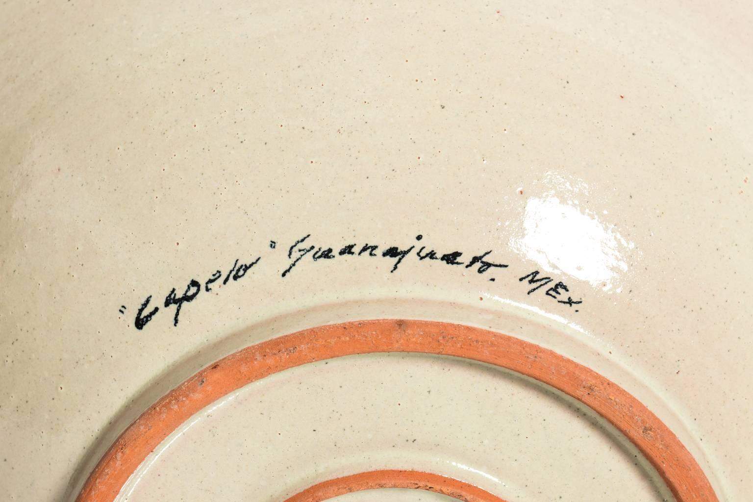 Blue and white painted Mexican sink that features an illustrated angel in the basin, circa 20th century.
   