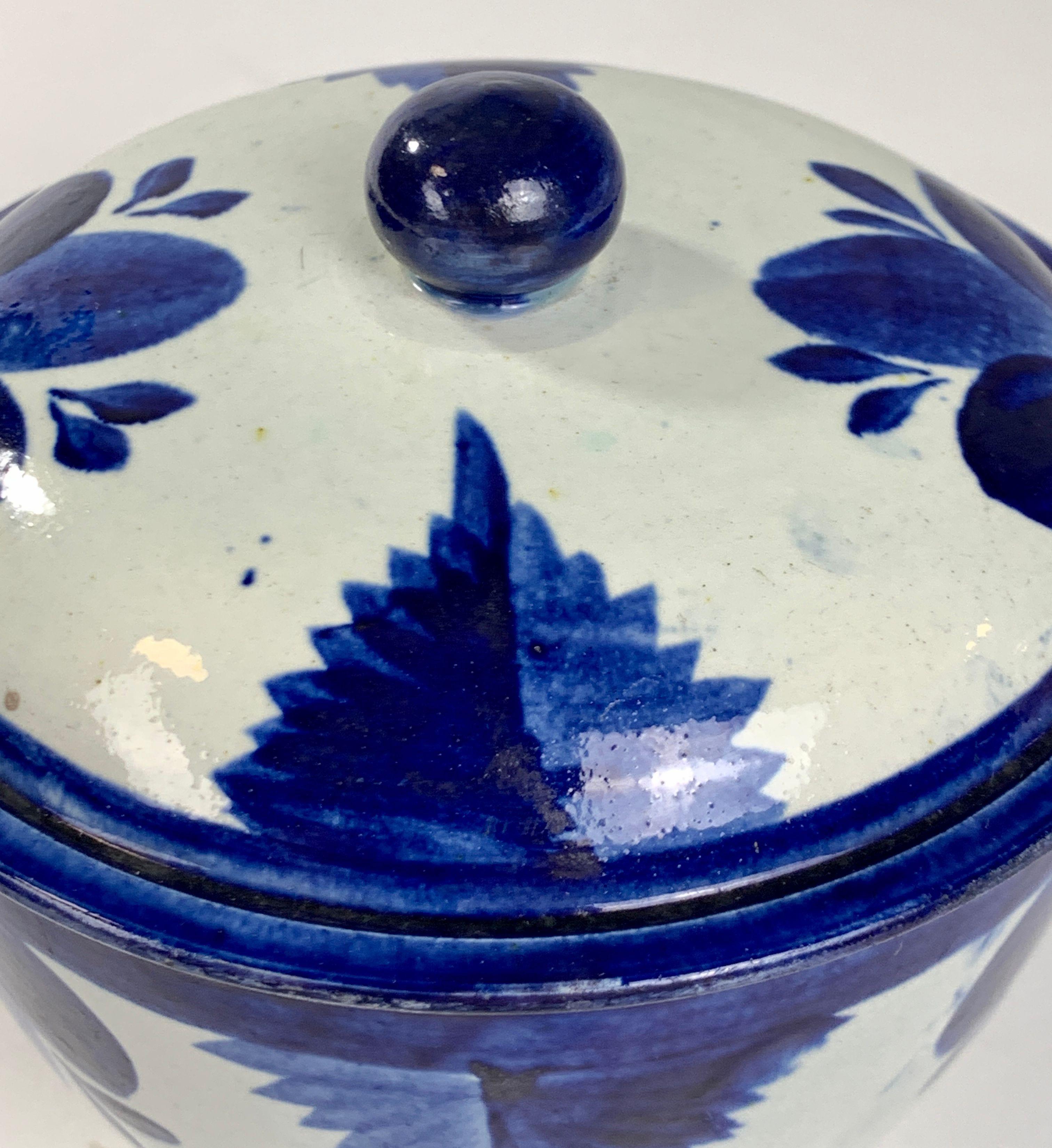 This lovely pearlware sugar box has the timeless appeal of soothing blue and white. Made in England in the early 19th century with blue decoration applied by hand using a stencil. Each design is slightly different, especially in the intensity of the