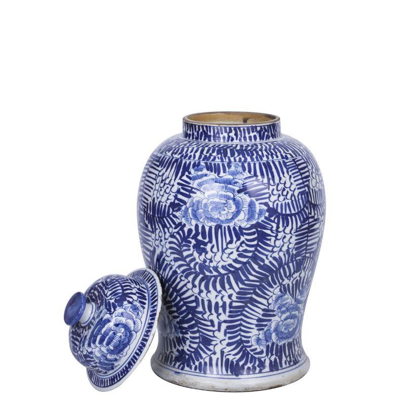 B&W blooming flowers temple jar 

The special antique process makes it looks like a piece of art from a museum. 
High fire porcelain, 100% hand shaped, hand painted. Distress, chips and other imperfections create great characters of this special