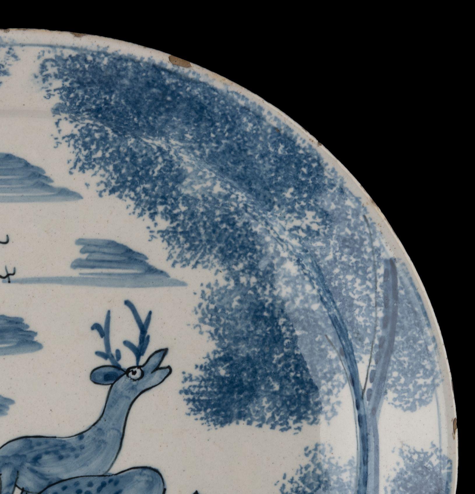 Glazed Blue and white plate with deer in a landscape Delft, circa 1700 For Sale