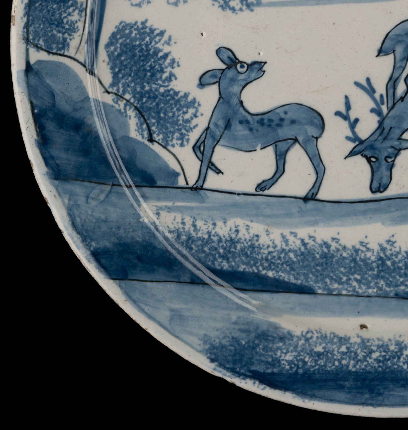 18th Century Blue and white plate with deer in a landscape Delft, circa 1700 For Sale