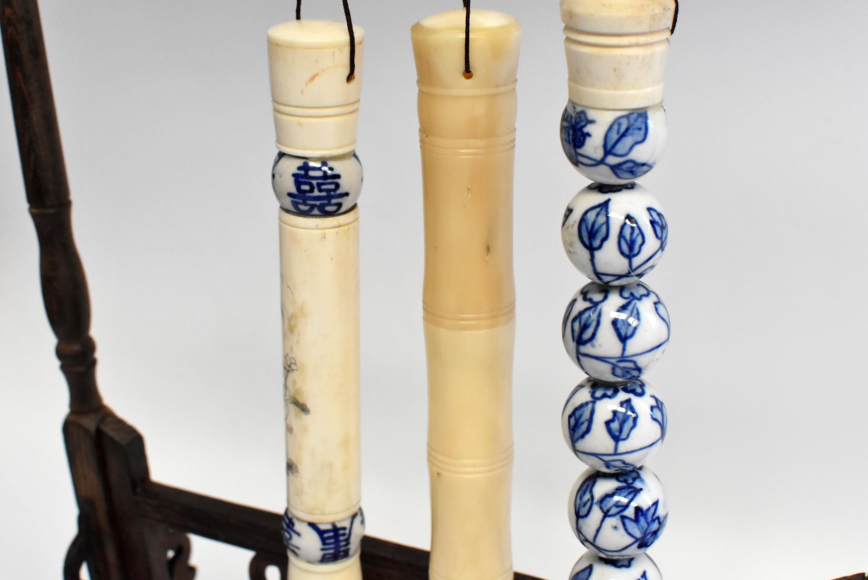 Beautiful set of 3 large Chinese calligraphy brushes with handmade handles. This collection consists 3 brushes among which 1 with a bamboo pattern cow bone handle, 1 with hand painted blue and white porcelain balls, and 1 with a finely carved bone