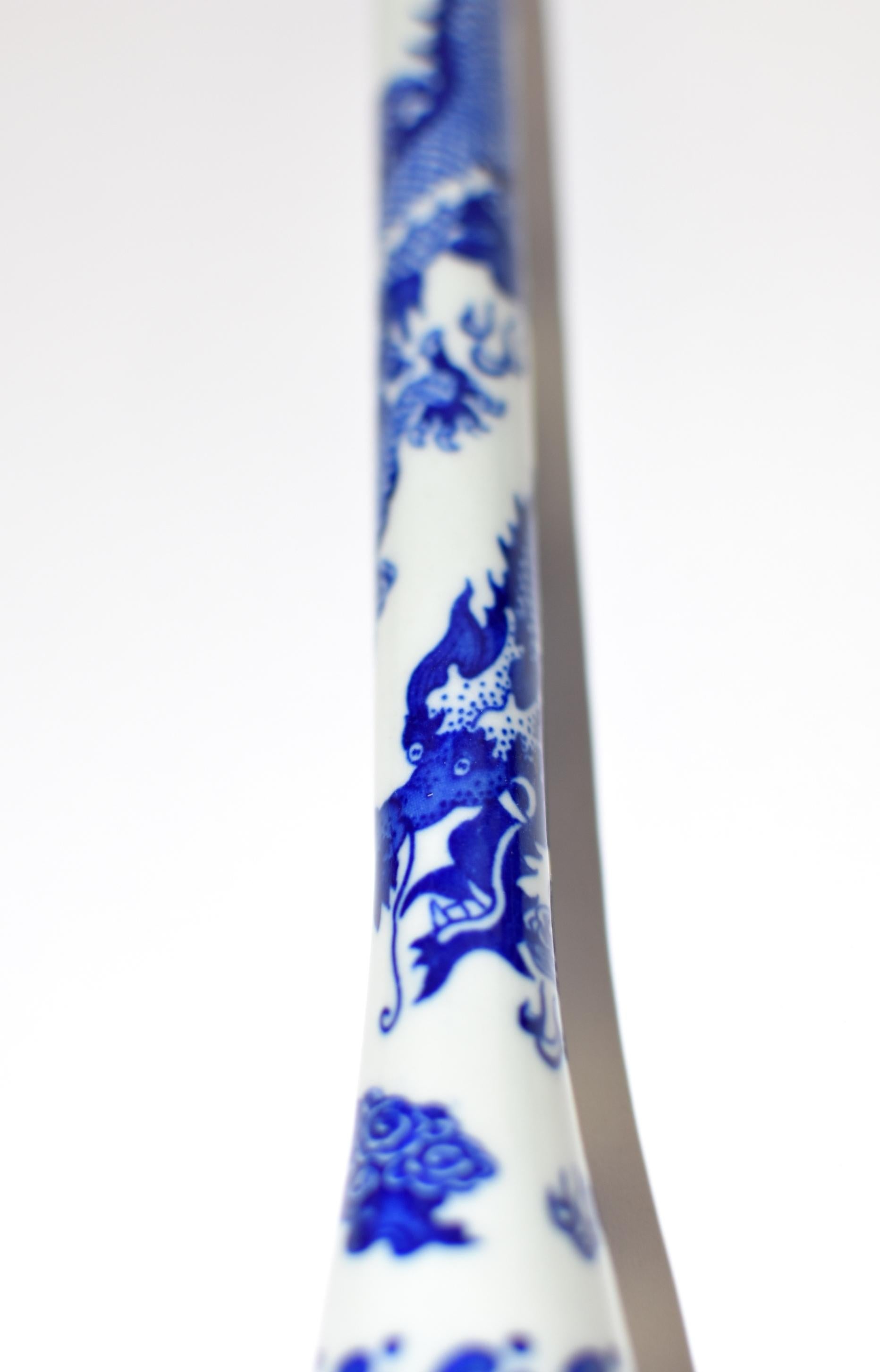 An one of a kind handmade calligraphy brush with beautiful blue and white hand painted dragon. This is a very special, rare piece. Bone ferrule and horse hair.