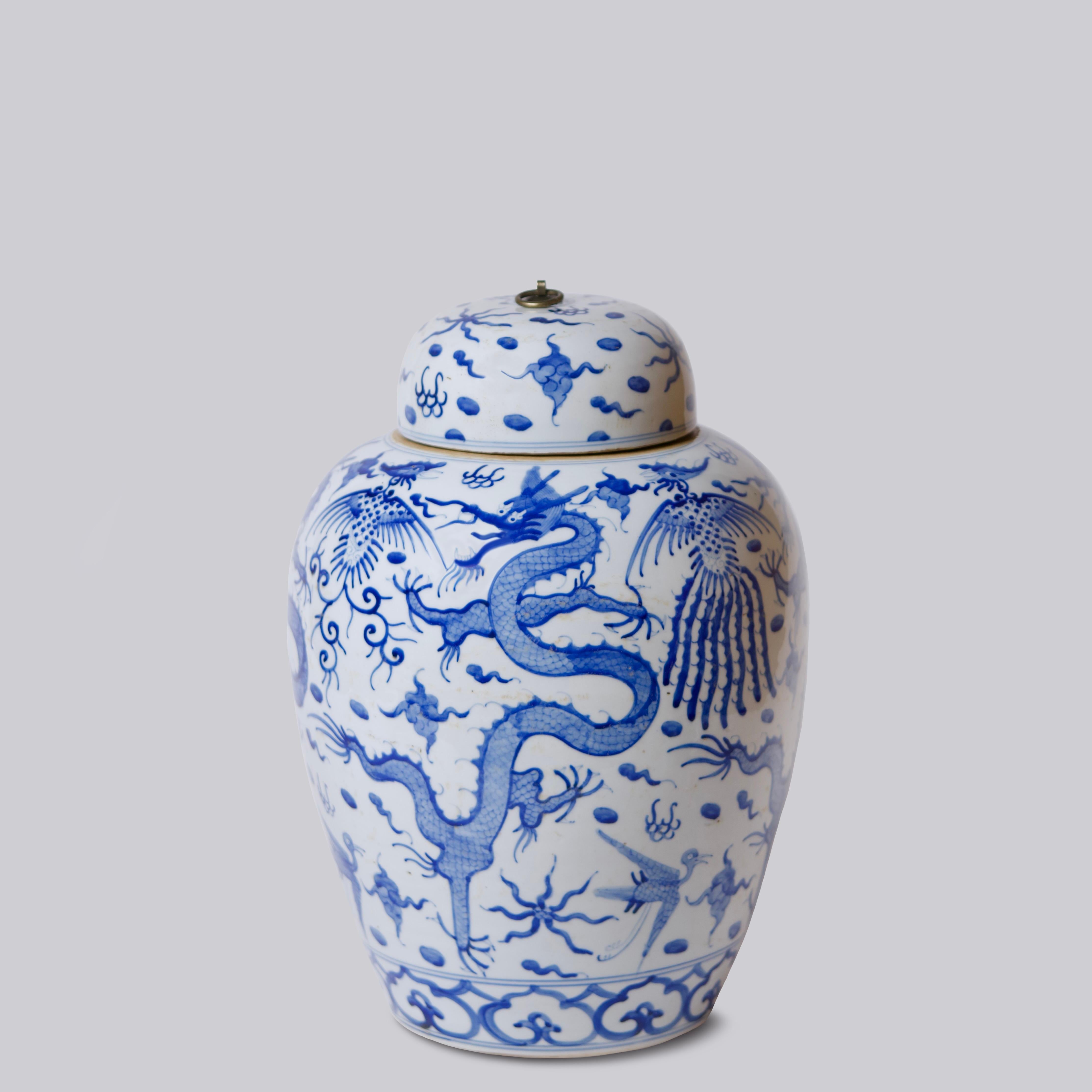 This lidded jar is a traditional porcelain vessel from Jingdezhen, a town long distinguished by imperial patronage. The porcelain lid has been augmented with a metal ring to add a material interest to the piece. This temple jar decorated with