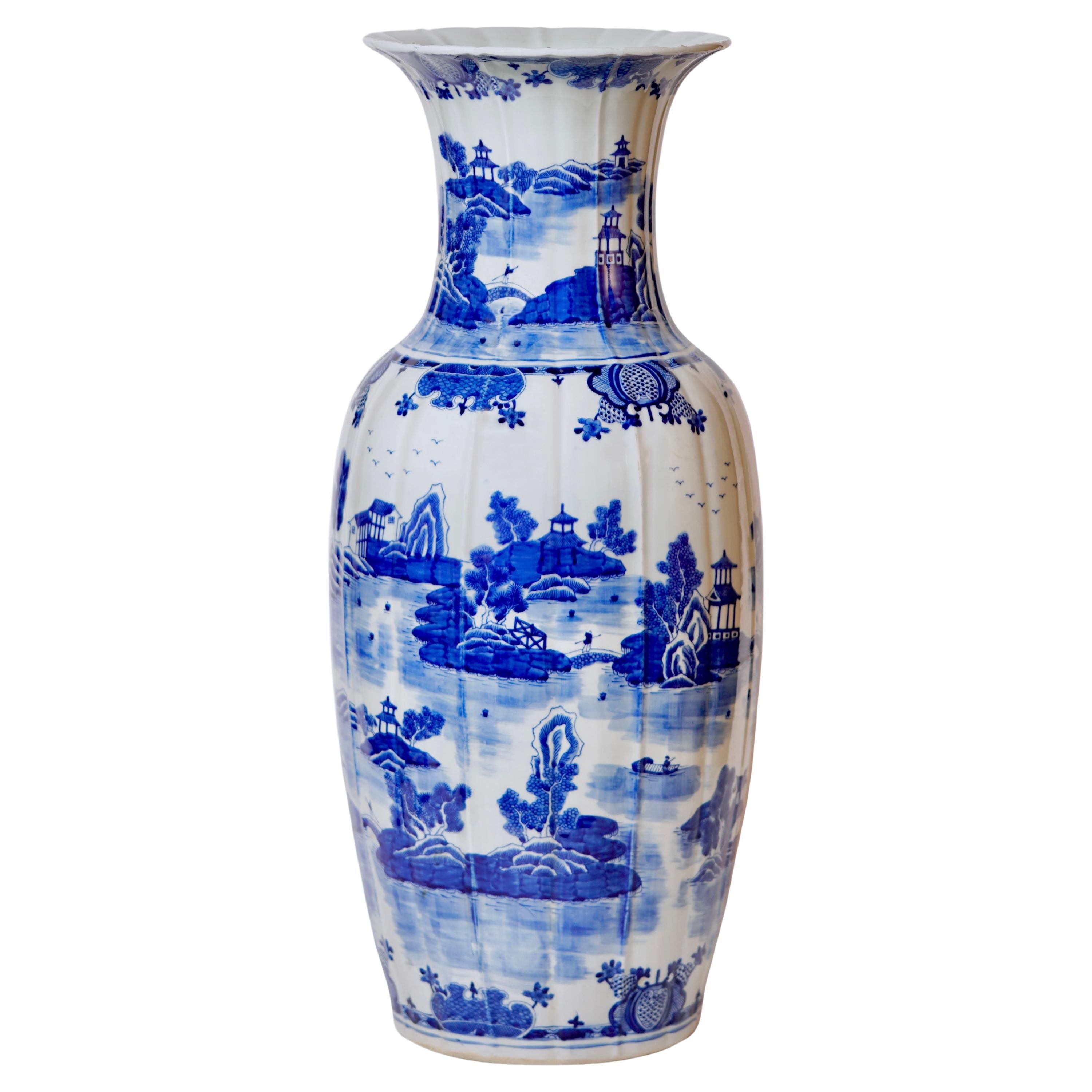 Blue and White Porcelain Ribbed Vase with Willow Ware Pattern For Sale