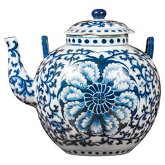 Vintage Blue and White Porcelain Teapot with Scrolling Foliage and Floral Decor