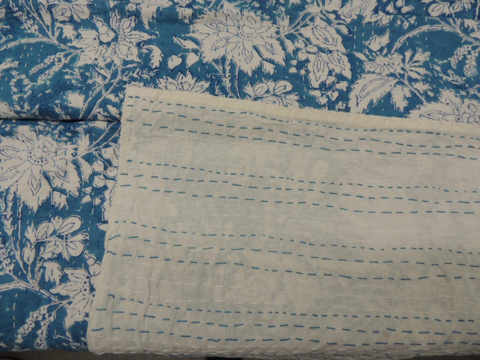 Blue and White Quilted Blanket.
Blue and white floral pattern with hand-stitches all around.
Off white cotton backing with blue and white threads.
Size: 90