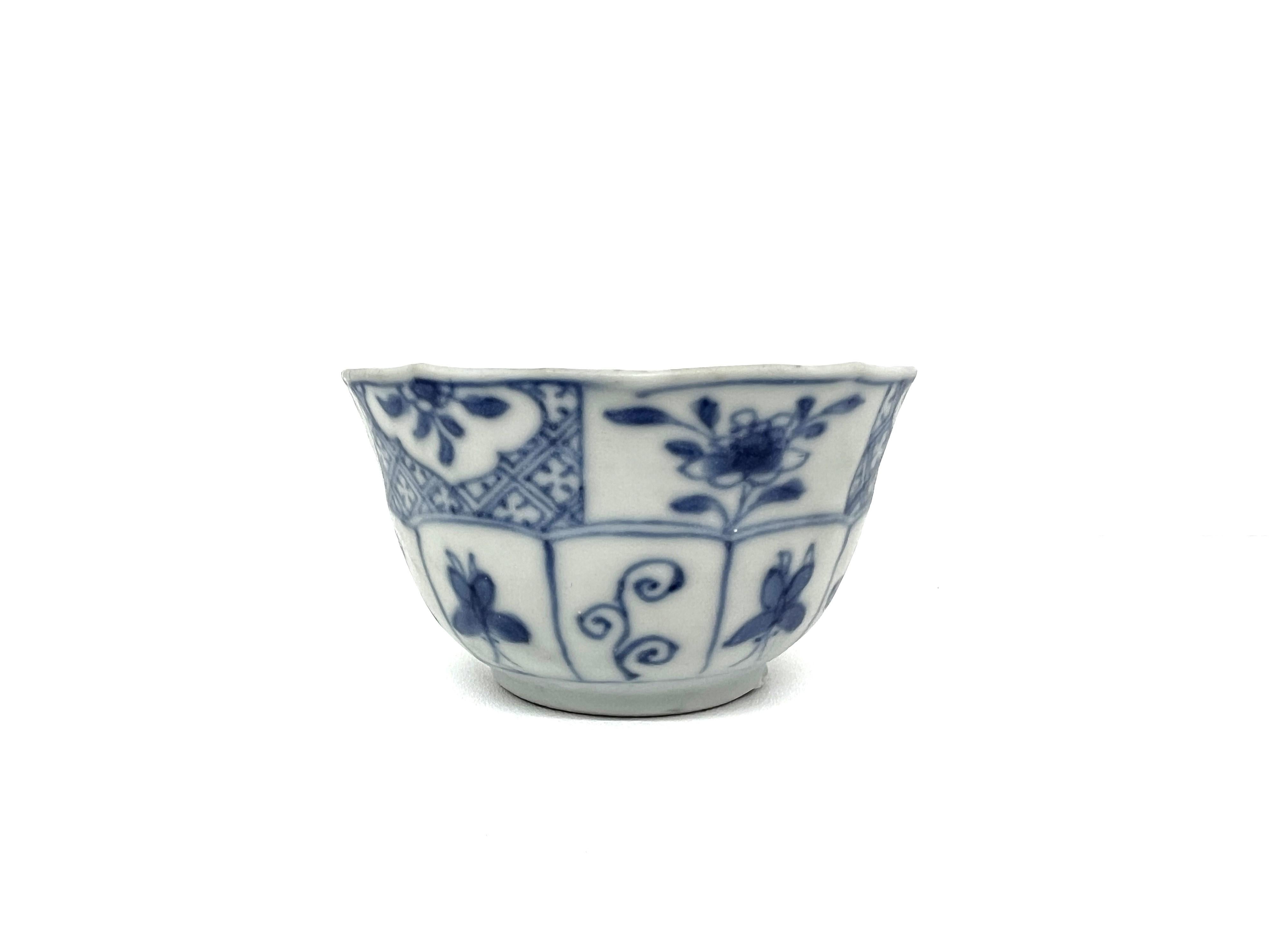 The teabowl depicts botanical elements and butterflies, motifs rich in symbolism within Chinese culture. Butterflies often represent transformation and immortality, while the various flowers and plants indicate the changing seasons and nature's