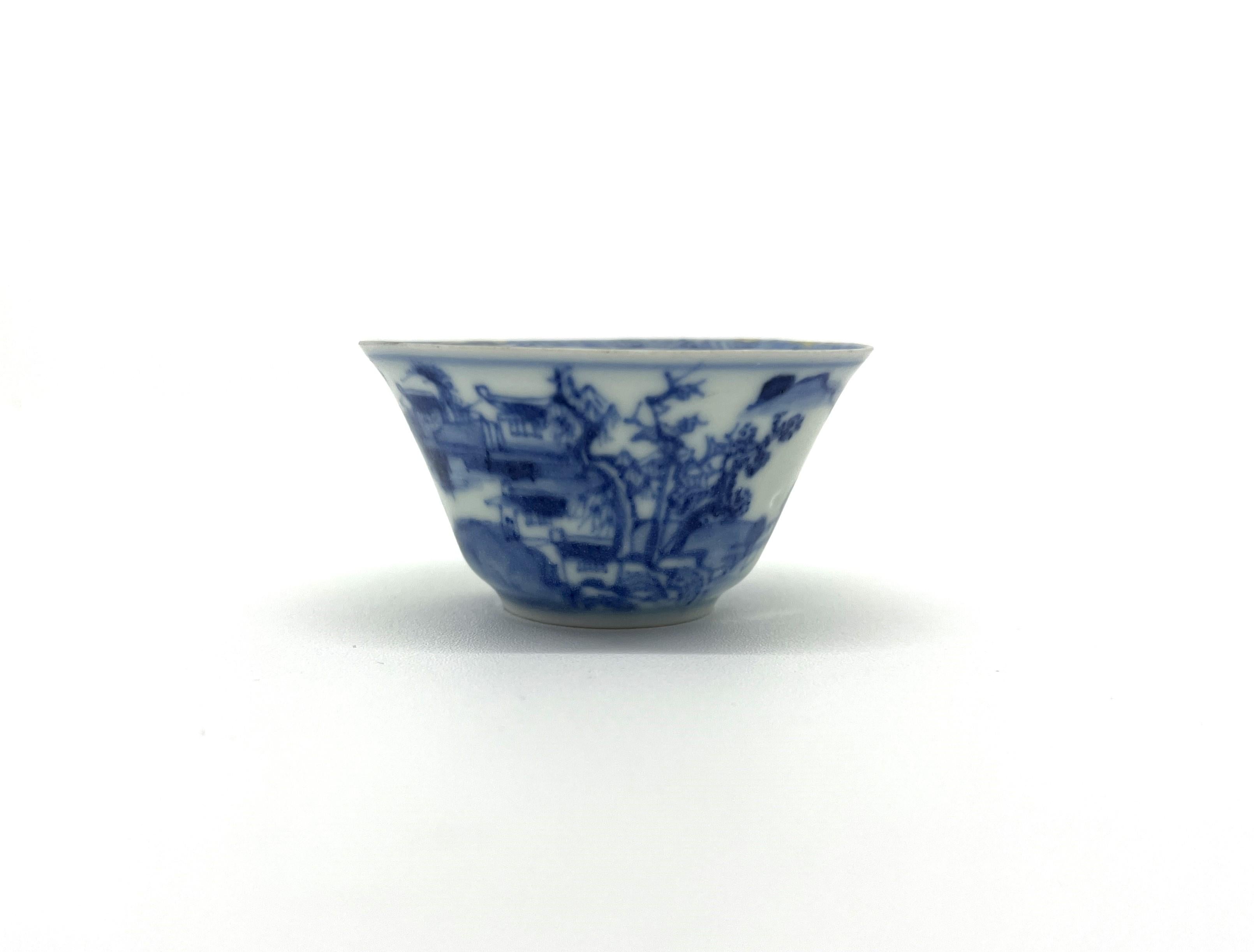 Scene with multiple figures on a boat, which is a common theme in Chinese porcelain, reflecting the cultural and economic importance of sea travel and trade in Chinese history. The figures may represent traders, fishermen, or even scenes from