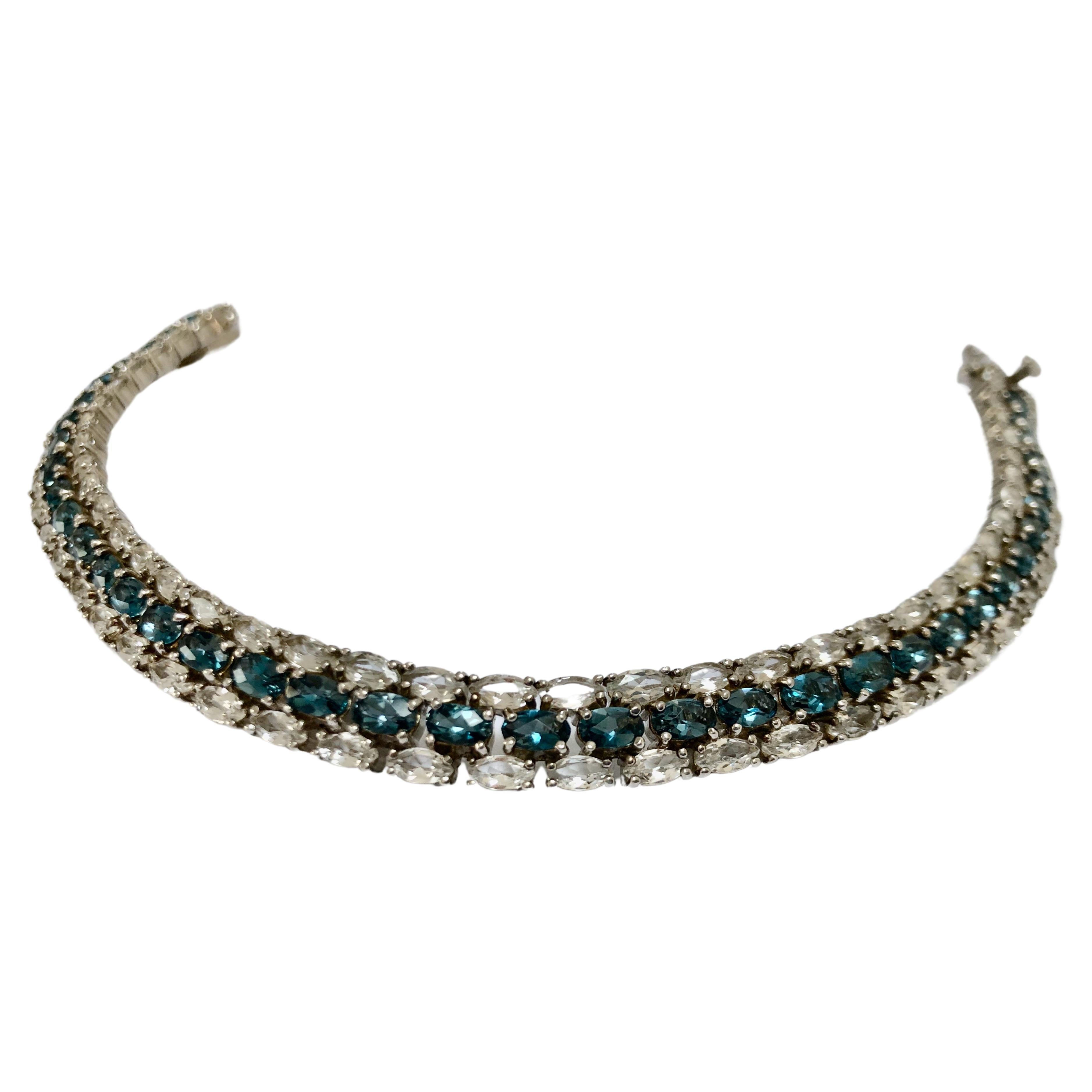 Armband aus Sterlingsilber mit blauem und weißem Topas (Ovalschliff) im Angebot