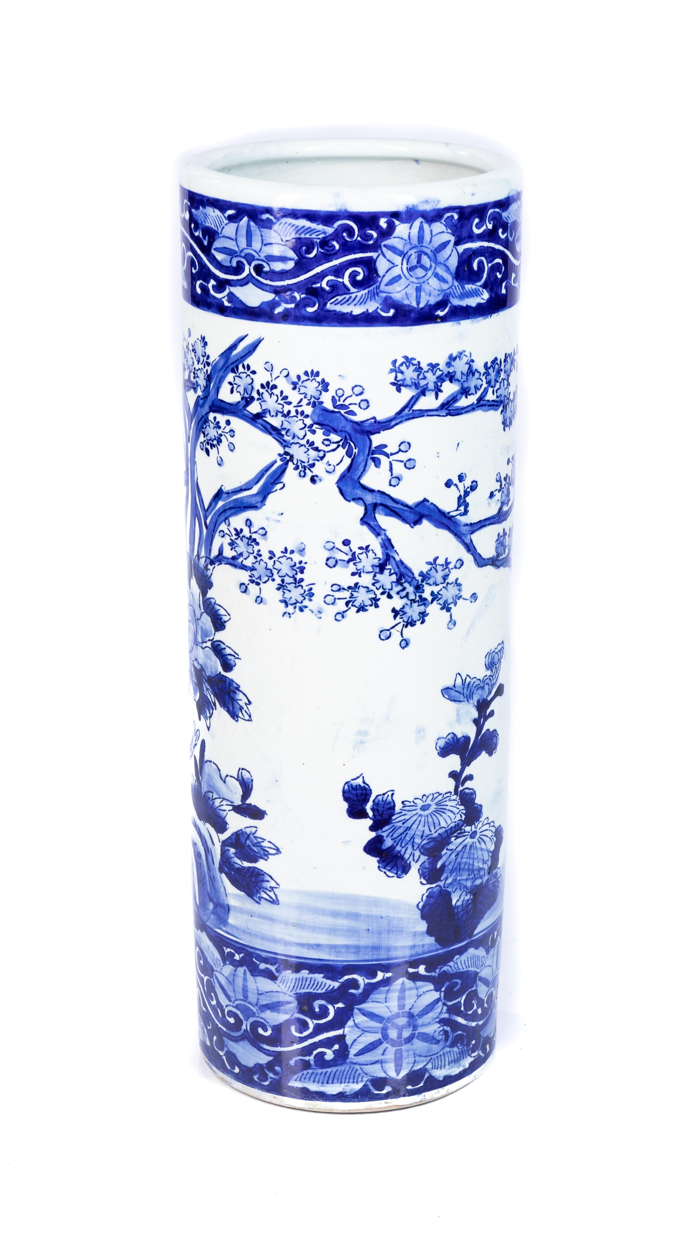 Offering this stunning blue and white Chinese umbrella stand. With hand painted floral, birds, and other motifs it will fit beautifully at any entry of your home.