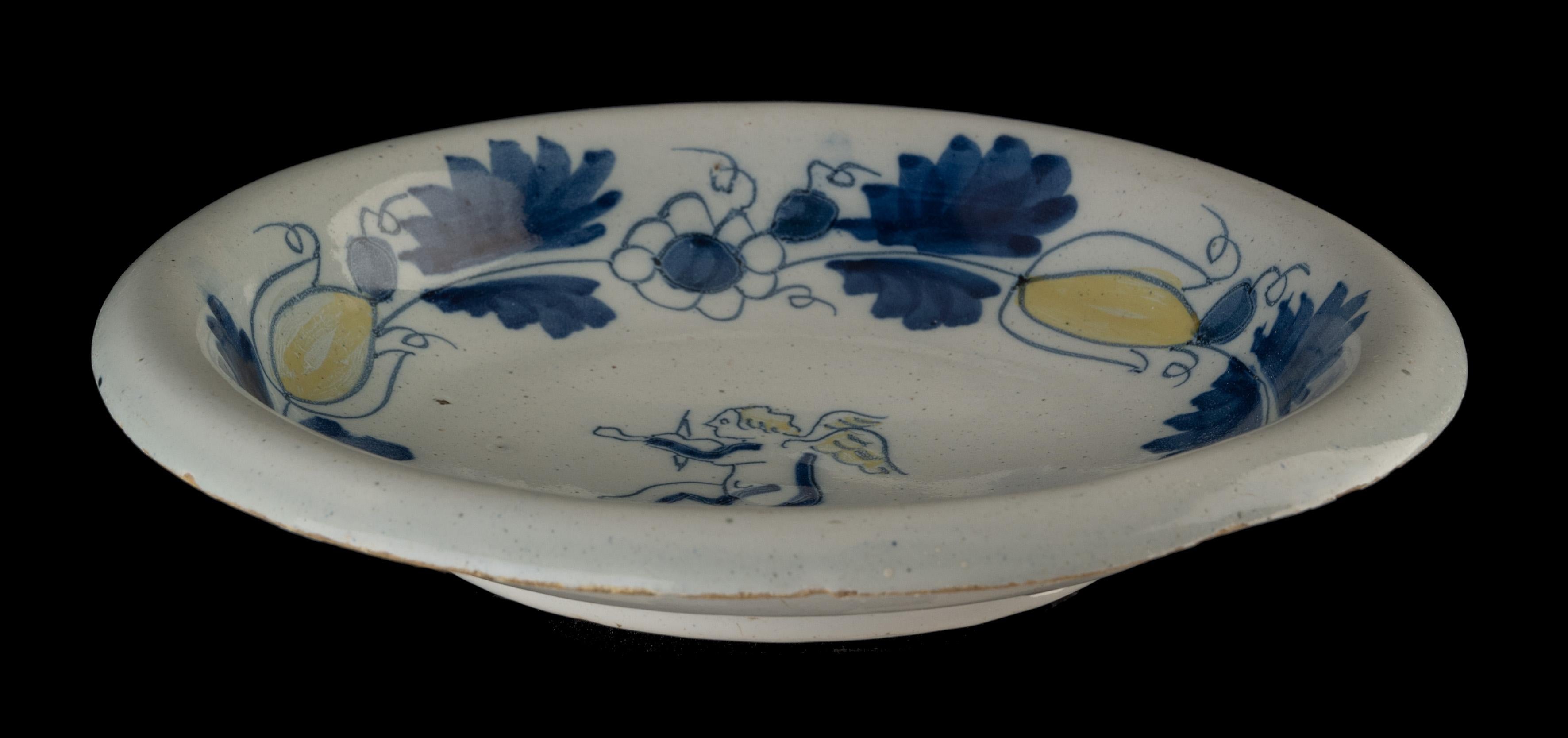 Dutch Blue and Yellow Bowl with Putto Delft, circa 1690 For Sale