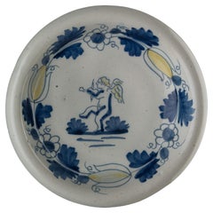 Antique Blue and Yellow Bowl with Putto Delft, circa 1690