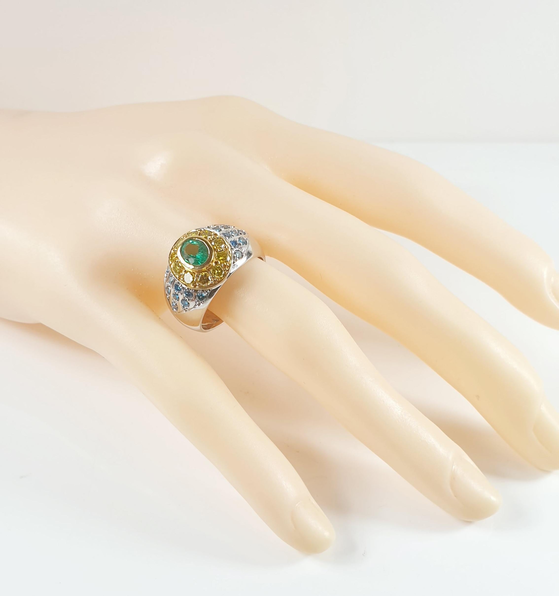 Women's Blue and Yellow Diamonds Pairing with a Tsavorite in an 18 Karat White Gold Ring For Sale