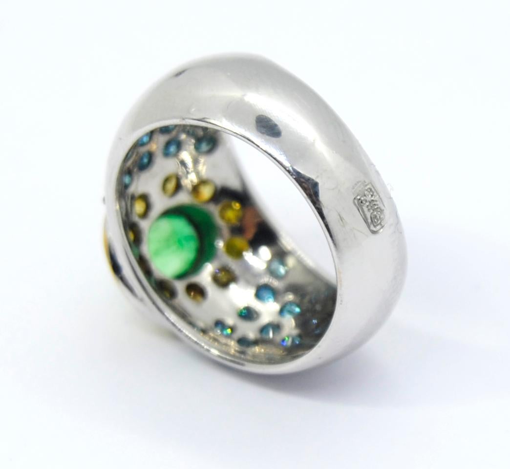 Oval Cut Blue and Yellow Diamonds Pairing with a Tsavorite in an 18 Karat White Gold Ring For Sale
