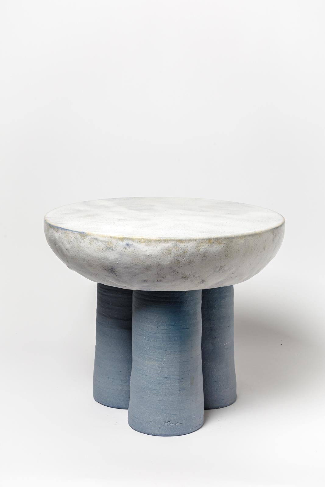 Blue and yellow glazed ceramic stool or coffee table by Mia Jensen. 
Artist signature under the base. 2023.
H : 15.7’ x 18.9’ inches.