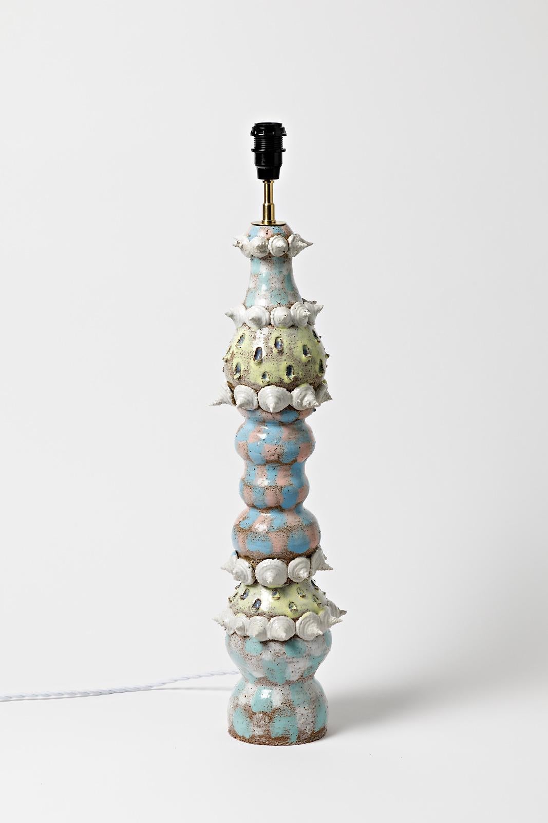 Mathilde Sauce

Unique piece, realised in 2021

Large stoneware ceramic table lamp

Blue, white and yellow ceramic glazes colors

Electrical system is new

Signed under the base

Ceramic measures - height : 51 cm Large : 14 cm
Measures